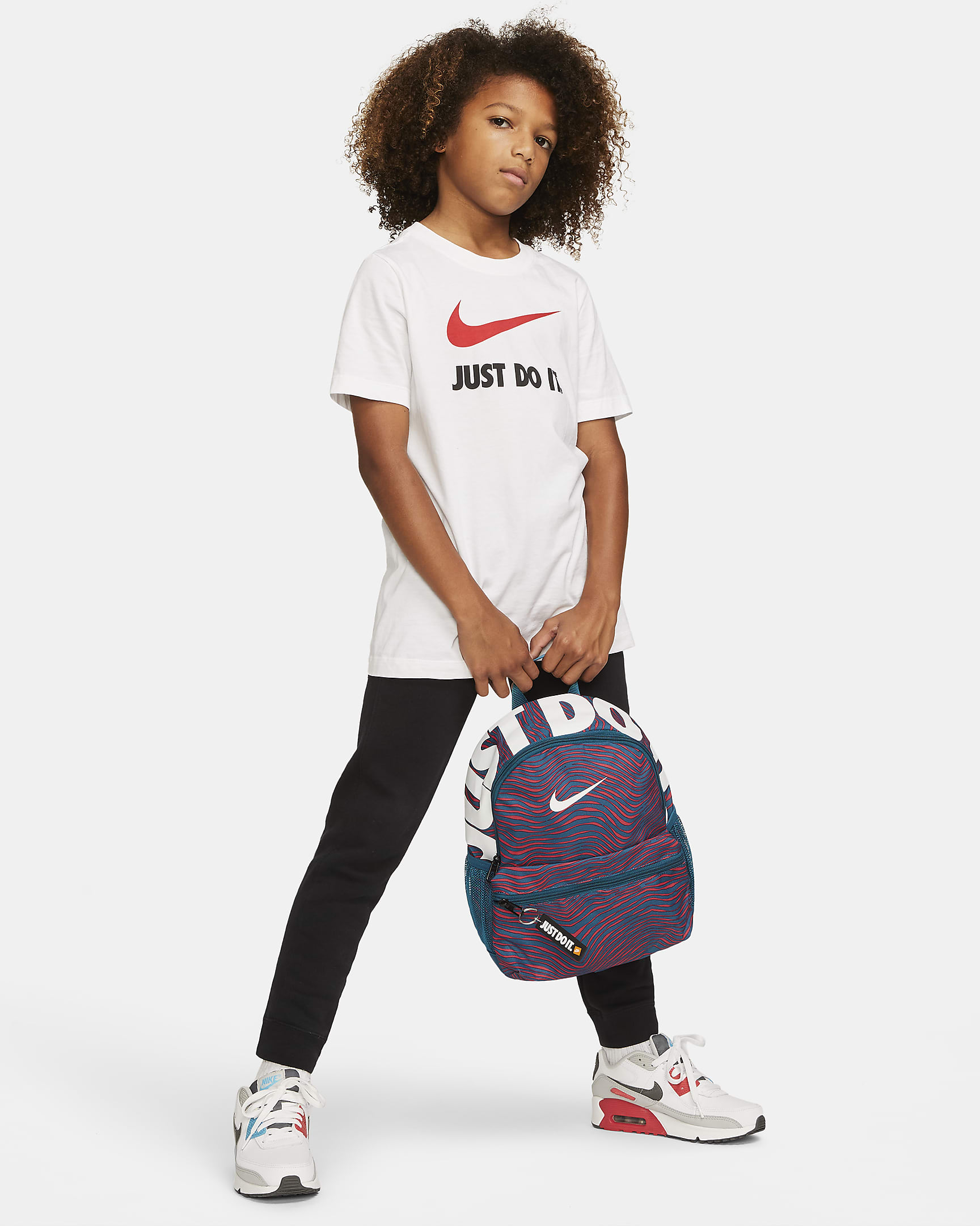 Nike Brasilia JDI Mini Kids' Printed Backpack (11L). Nike IN