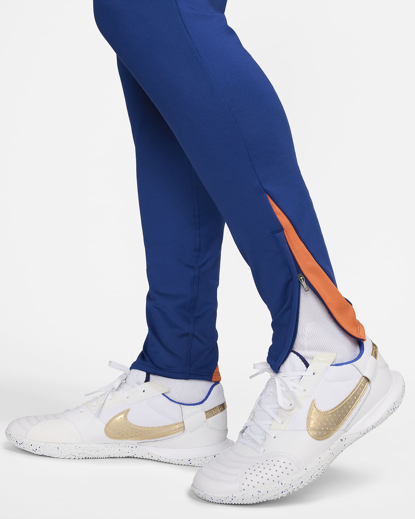 Pánské pleteninové fotbalové kalhoty Nike Dri-FIT Nizozemsko Strike - Deep Royal Blue/Safety Orange/Safety Orange