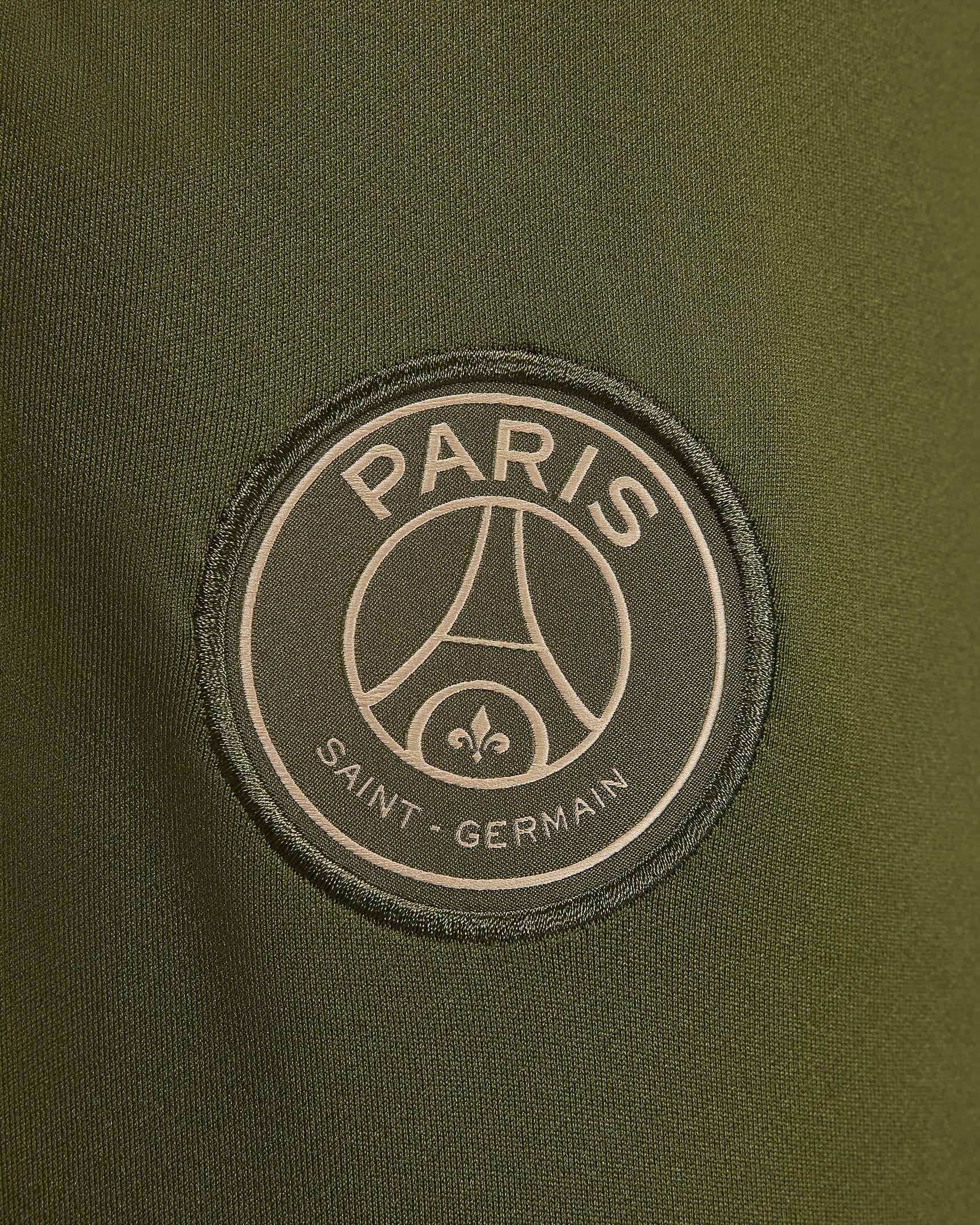 Damskie spodnie piłkarskie Jordan Dri-FIT Paris Saint-Germain Strike (wersja czwarta) - Rough Green/Hemp