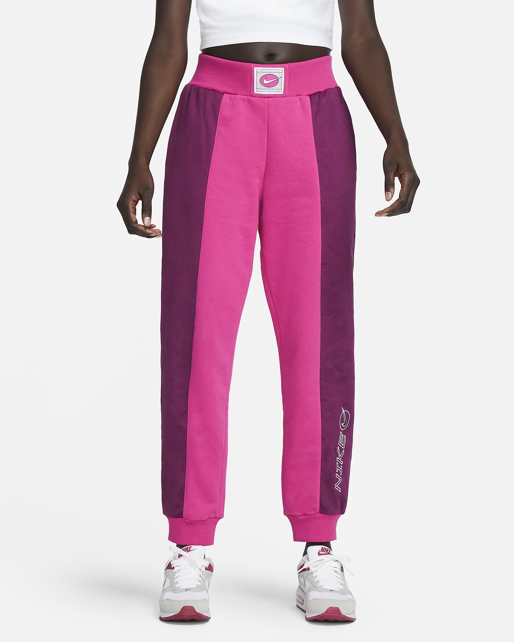 Pantalones de tejido Fleece de tiro medio para mujer Nike Sportswear Icon Clash - Rosa activo/Sangría/Blanco