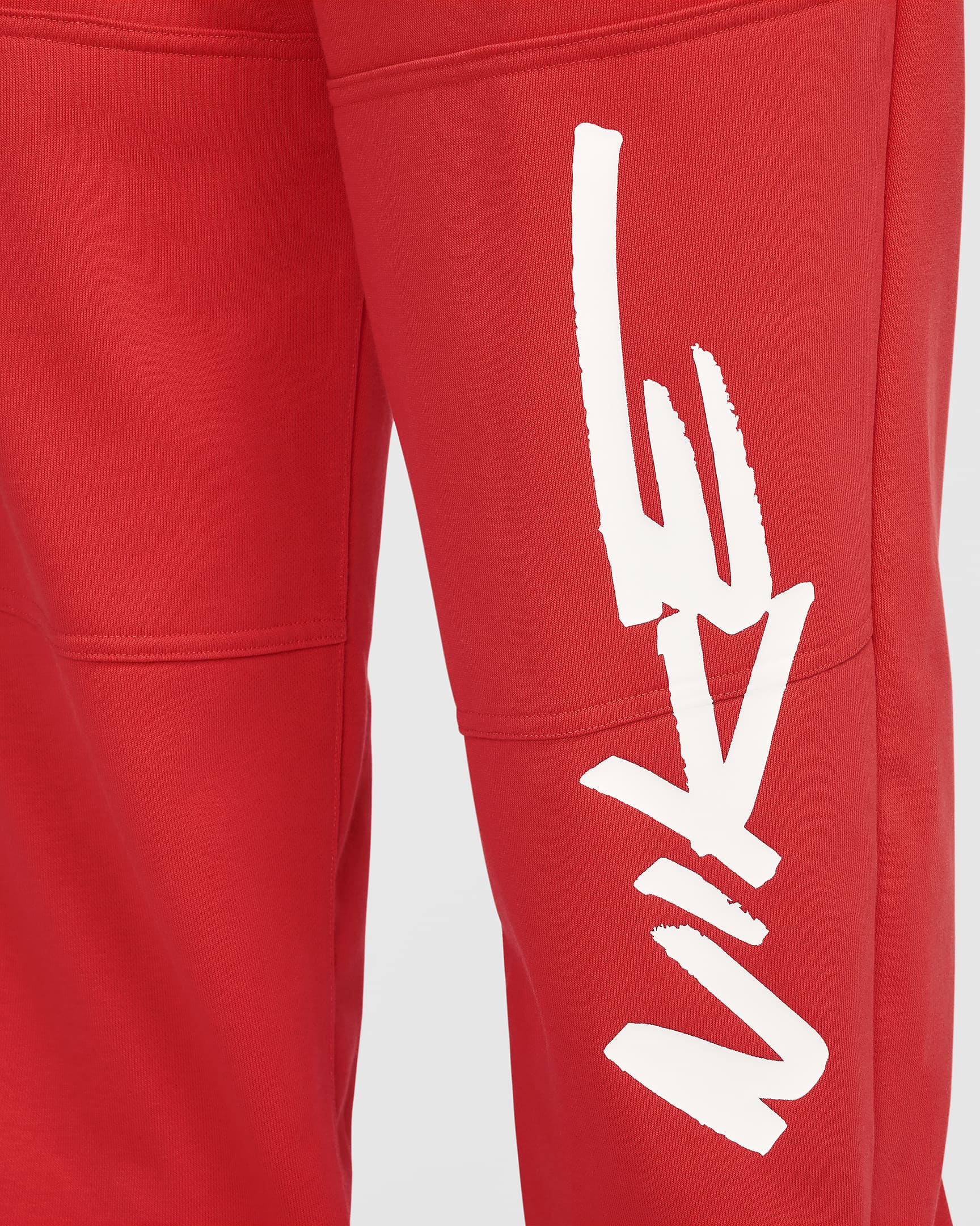 Pantalon oversize taille mi-haute en molleton Nike Sportswear Breaking pour femme - Light Crimson