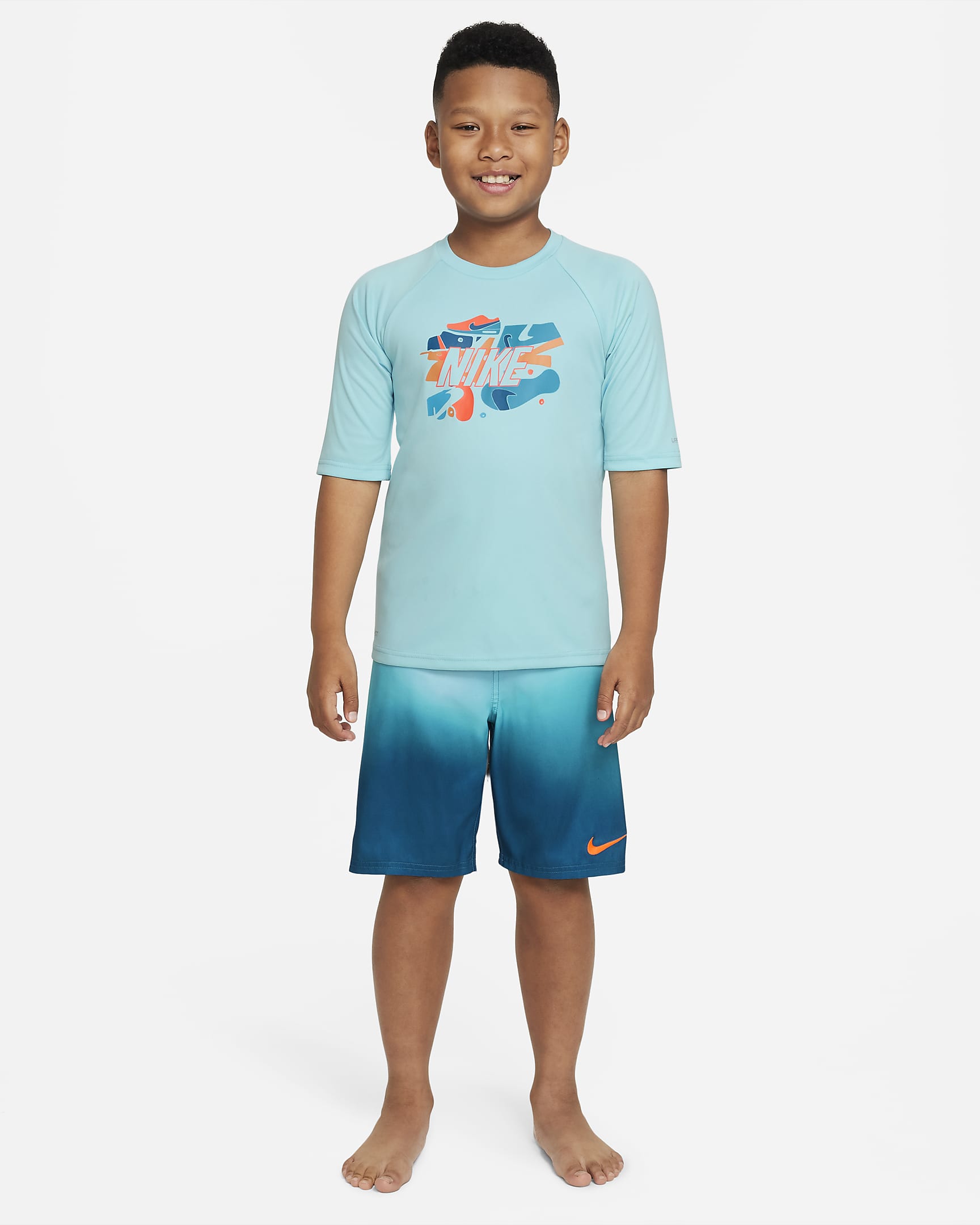 Nike Sneaker Big Kids' (Boys') Short-Sleeve Hydroguard Swim Shirt. Nike.com