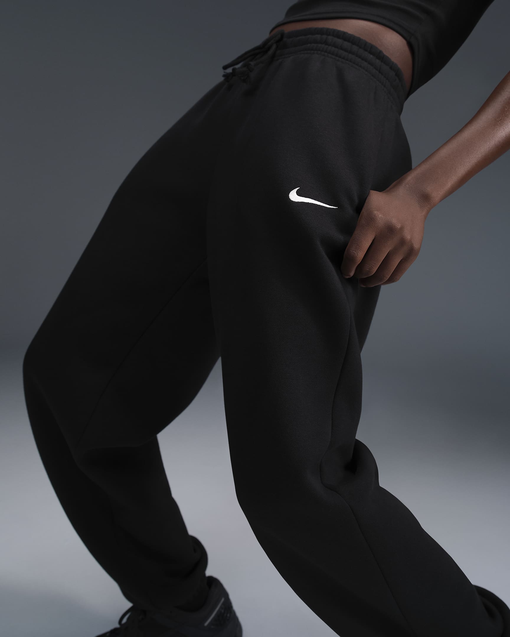 Pantaloni tuta oversize a vita alta Nike Sportswear Phoenix Fleece – Donna - Nero/Sail