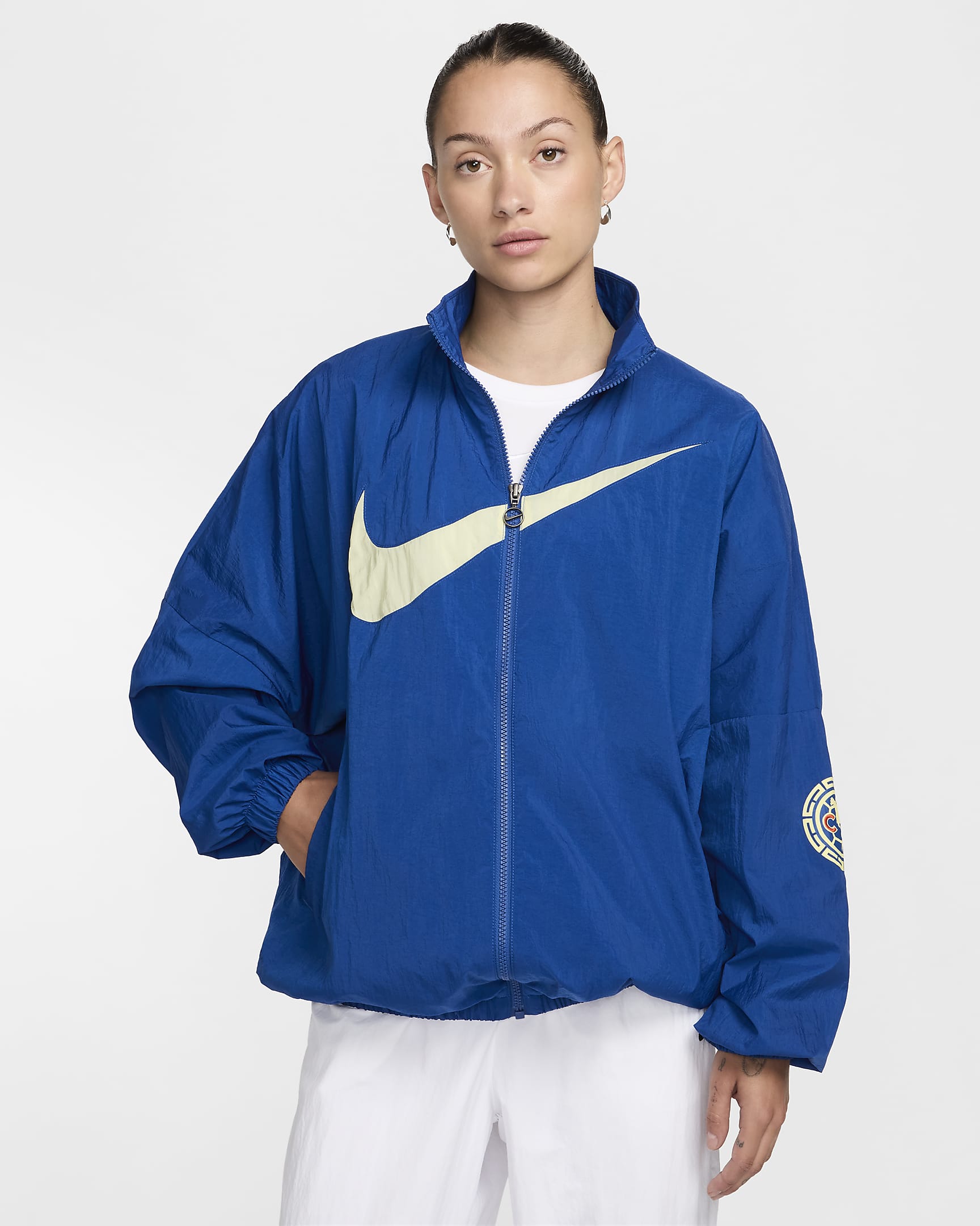 Chamarra de fútbol Nike de tejido Woven para mujer Club América Essential - Azul gimnasio/Chifón limón