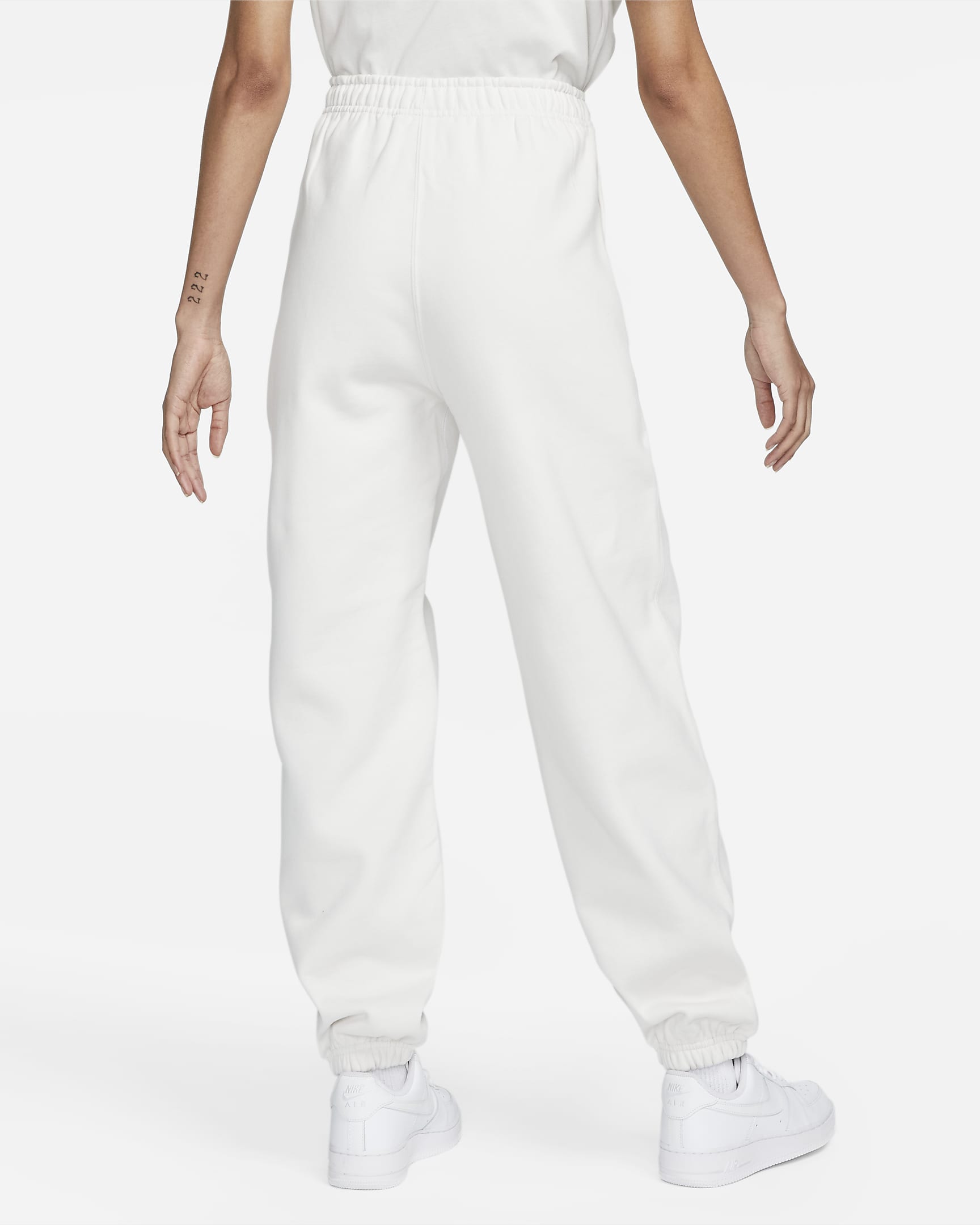 Pantalon en tissu Fleece Nike Solo Swoosh pour Femme - Phantom/Blanc