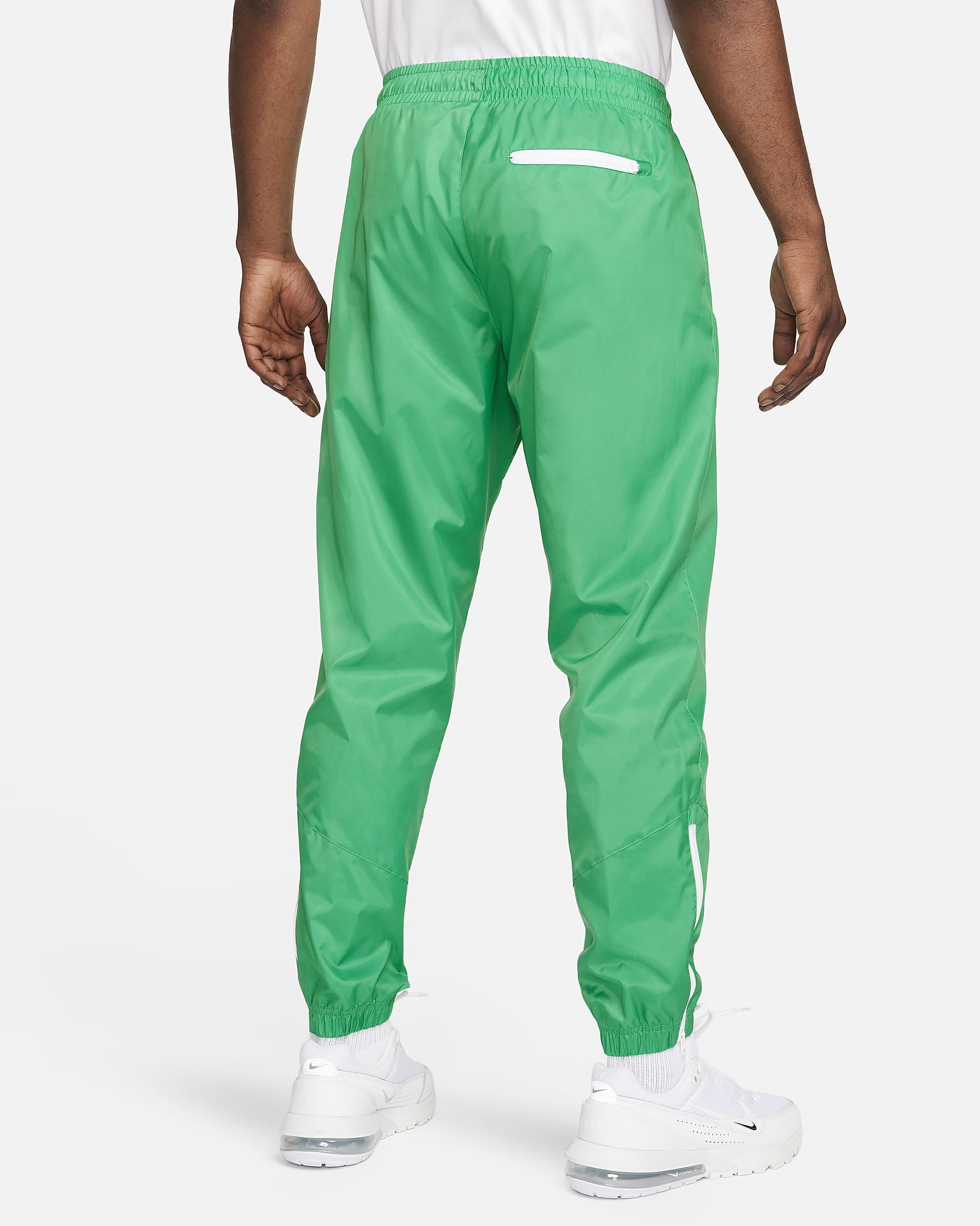 Pantalon doublé en tissu tissé Nike Windrunner pour homme - Stadium Green/Noir