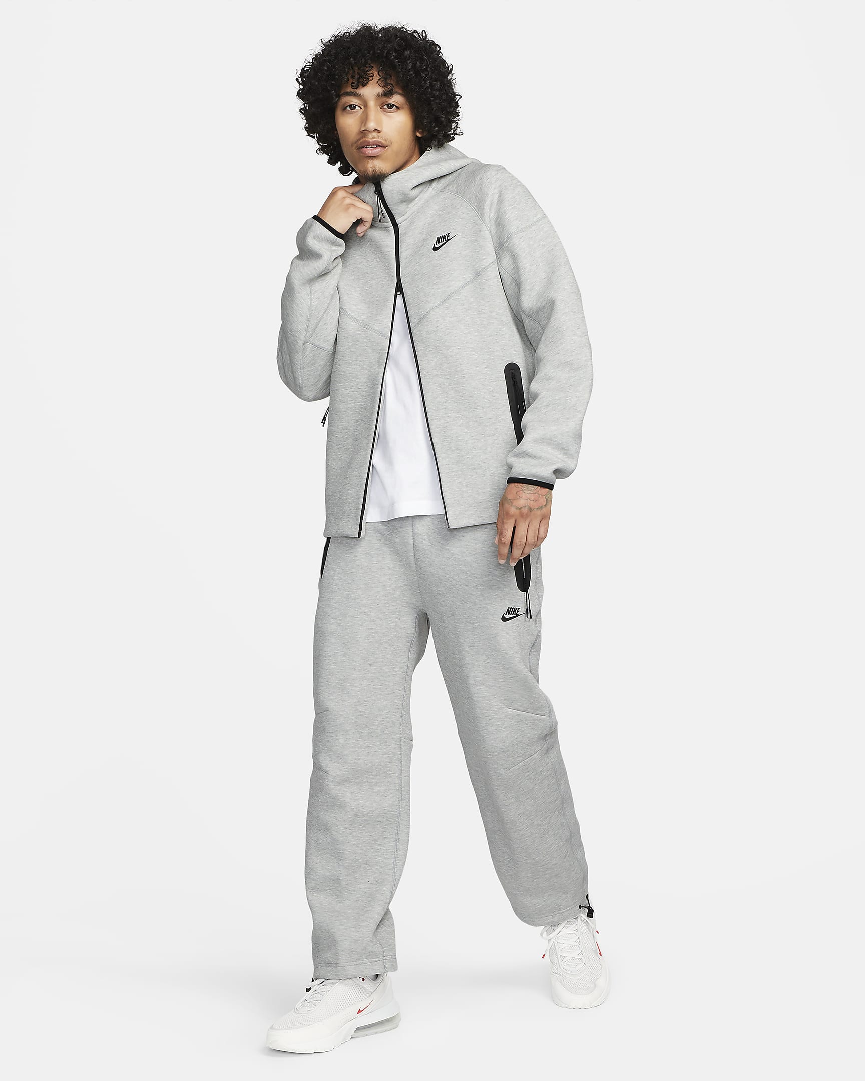 Nike Sportswear Tech Fleece joggebukse med åpen fald til herre - Dark Grey Heather/Svart