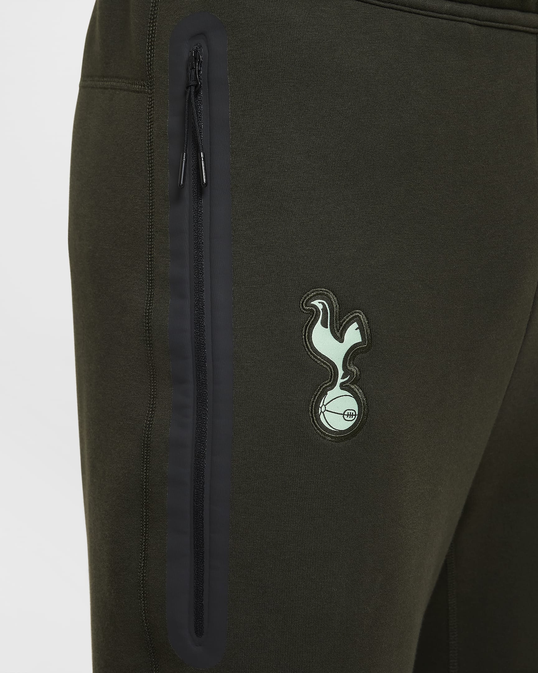 Tottenham Hotspur Tech Fleece Derde Nike voetbalbroek voor heren - Sequoia/Enamel Green