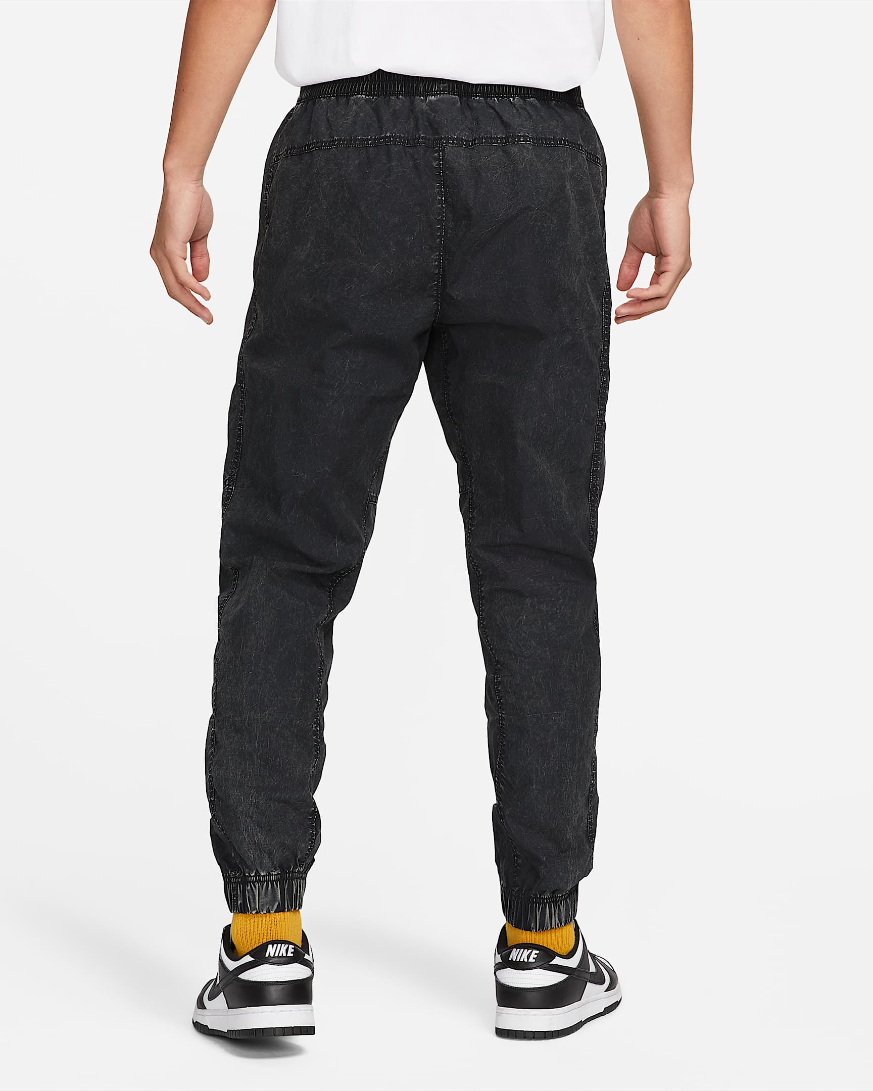 Nike Club+ Men's Unlined Woven Joggers. Nike IL