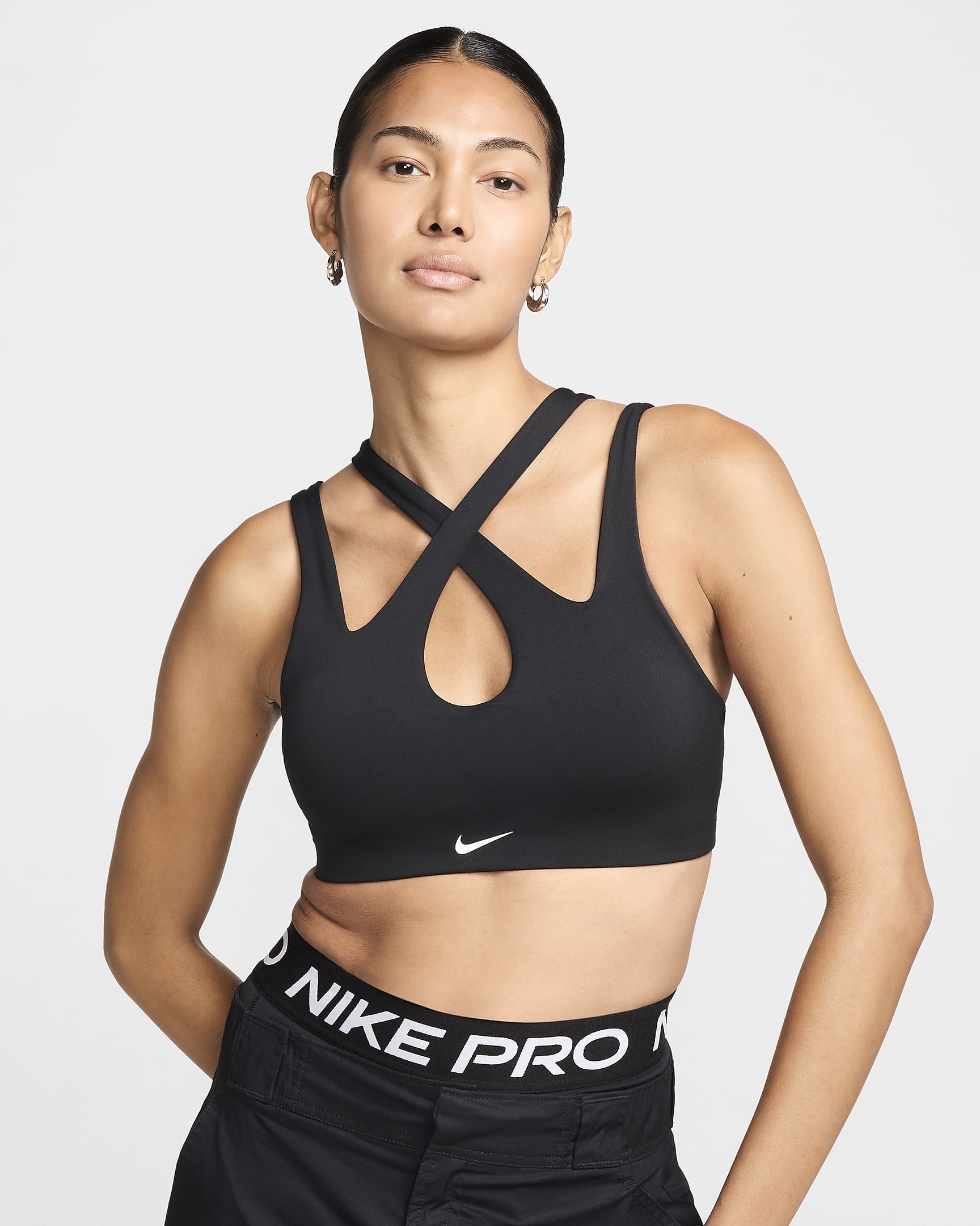 Dámská sportovní podprsenka s lehkou oporou a vycpávkami Nike Freestyle - Černá/Bílá