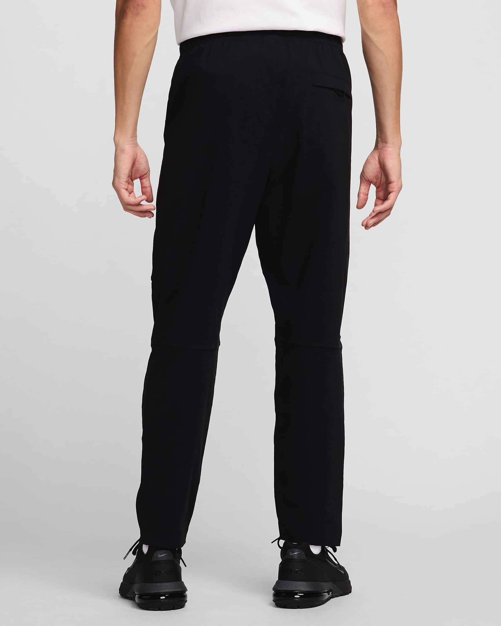 Pantaloni in tessuto Nike Tech – Uomo - Nero/Nero