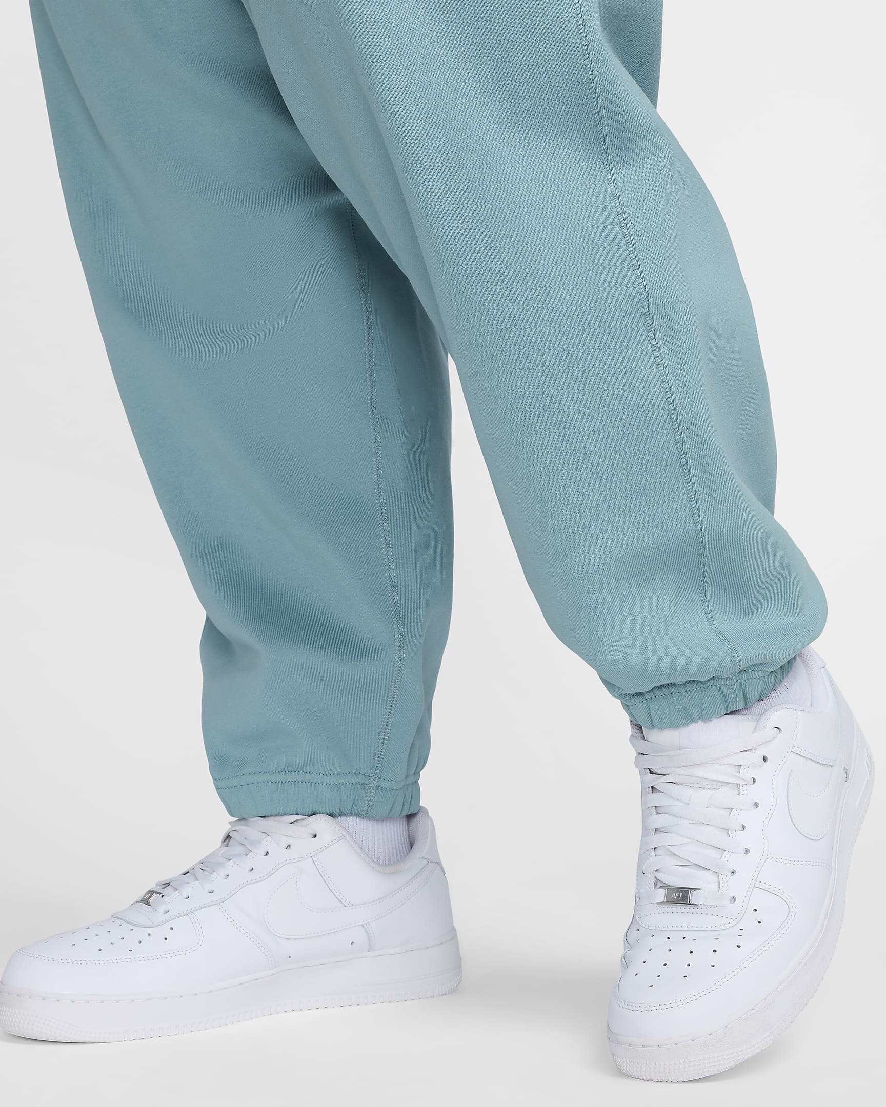 Pantaloni in fleece Nike Solo Swoosh - Uomo - Denim Turquoise/Bianco