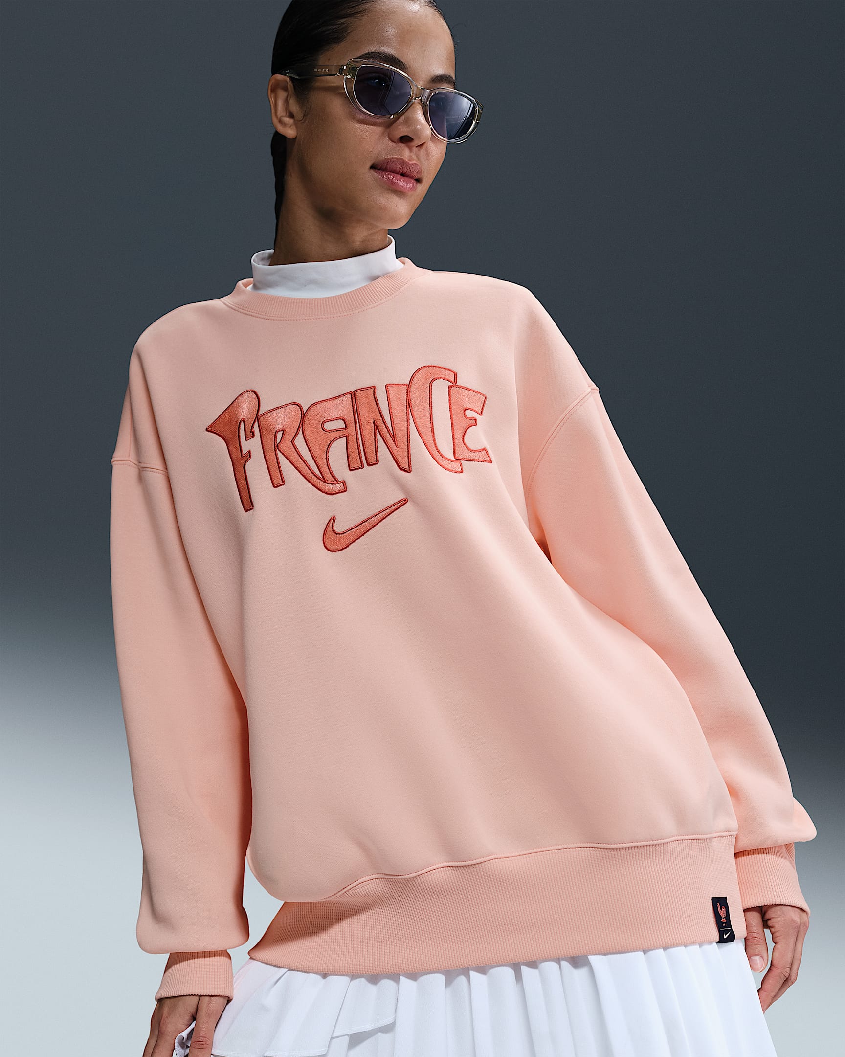 France Phoenix Fleece Women's Nike Football Oversized Crew-Neck Sweatshirt - Washed Coral/Washed Coral/Bleached Coral