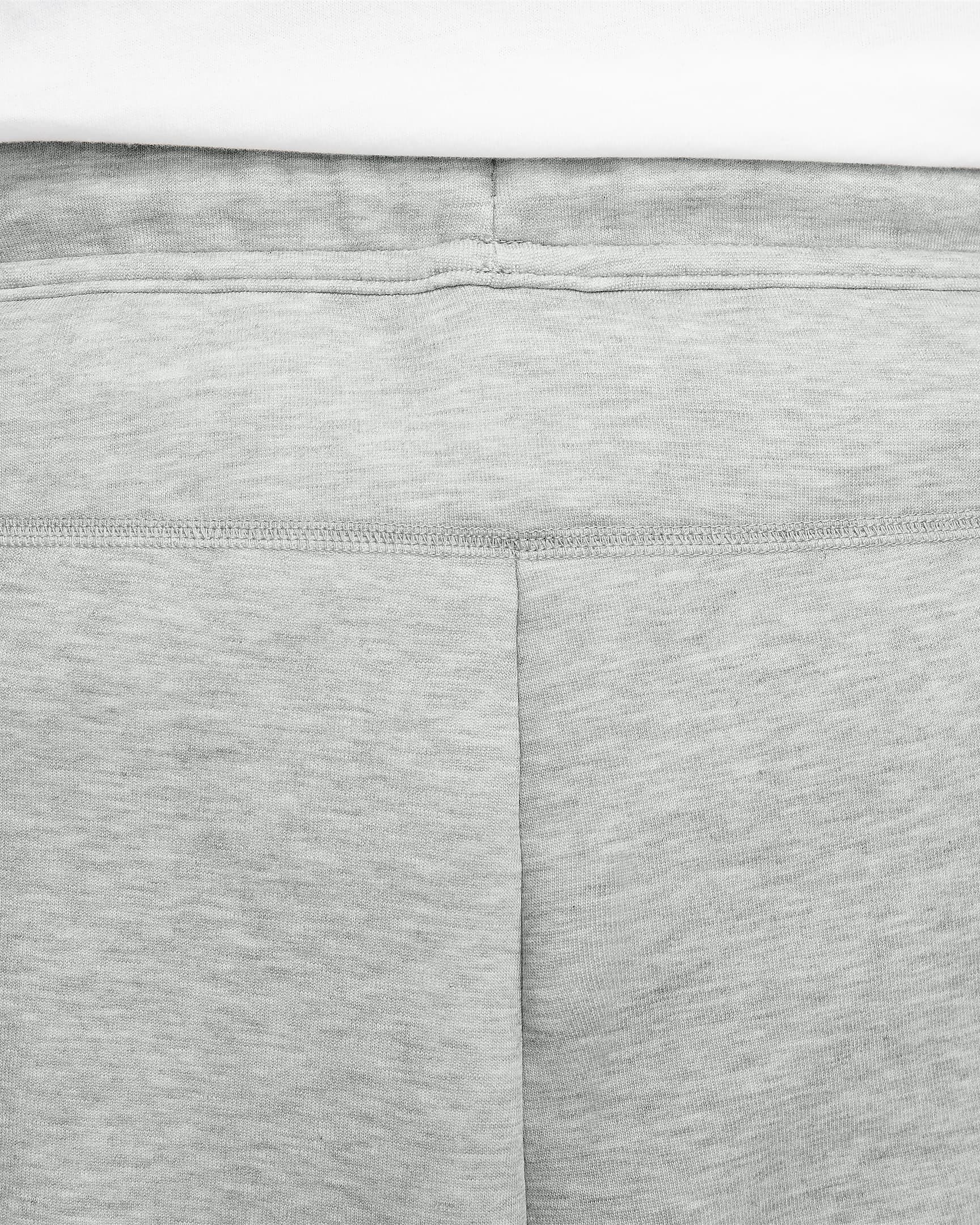 Sweatpants Nike Sportswear Tech Fleece med vida fållar för män - Dark Grey Heather/Svart