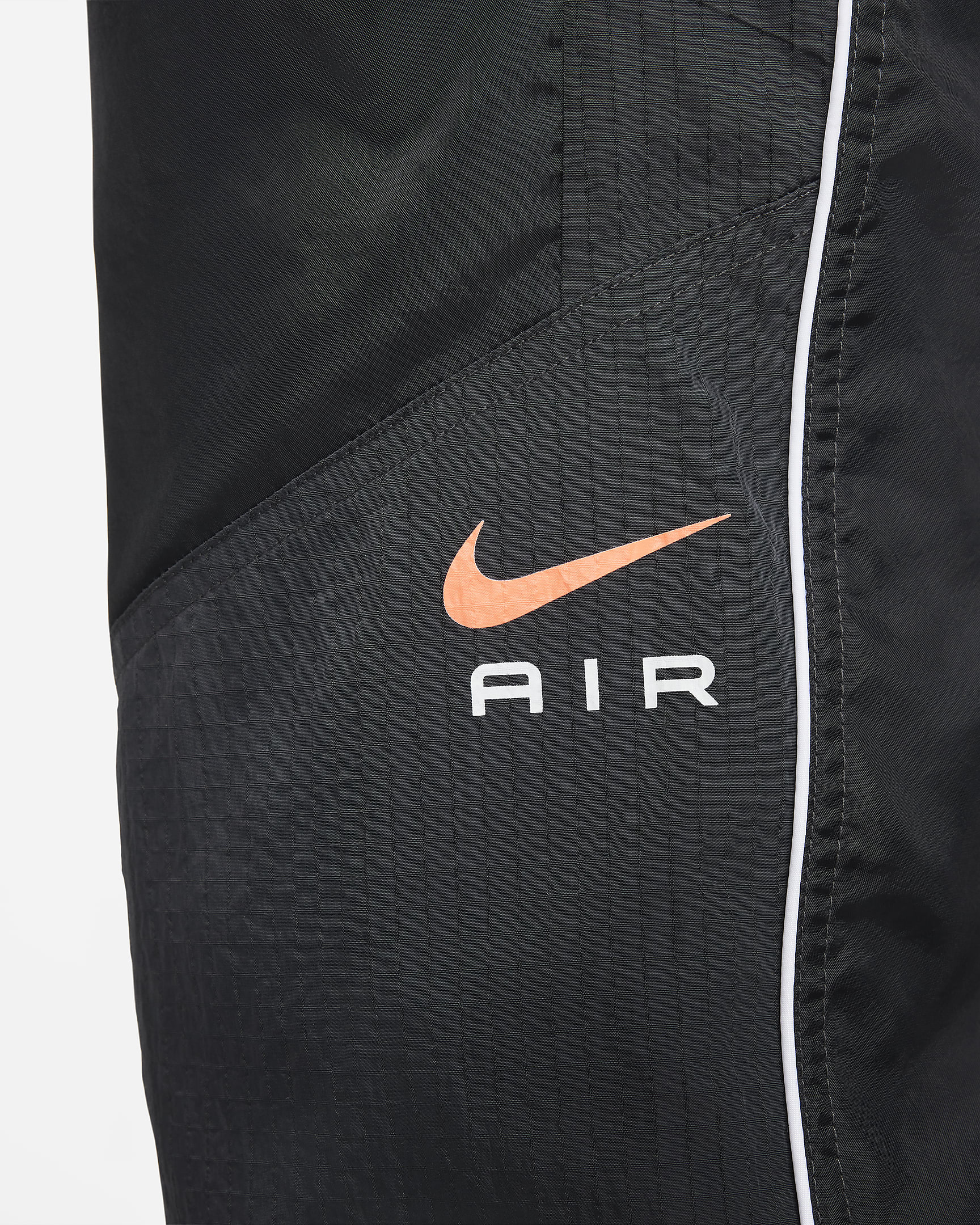 Nike Air x Marcus Rashford Men's Woven Trousers. Nike AT