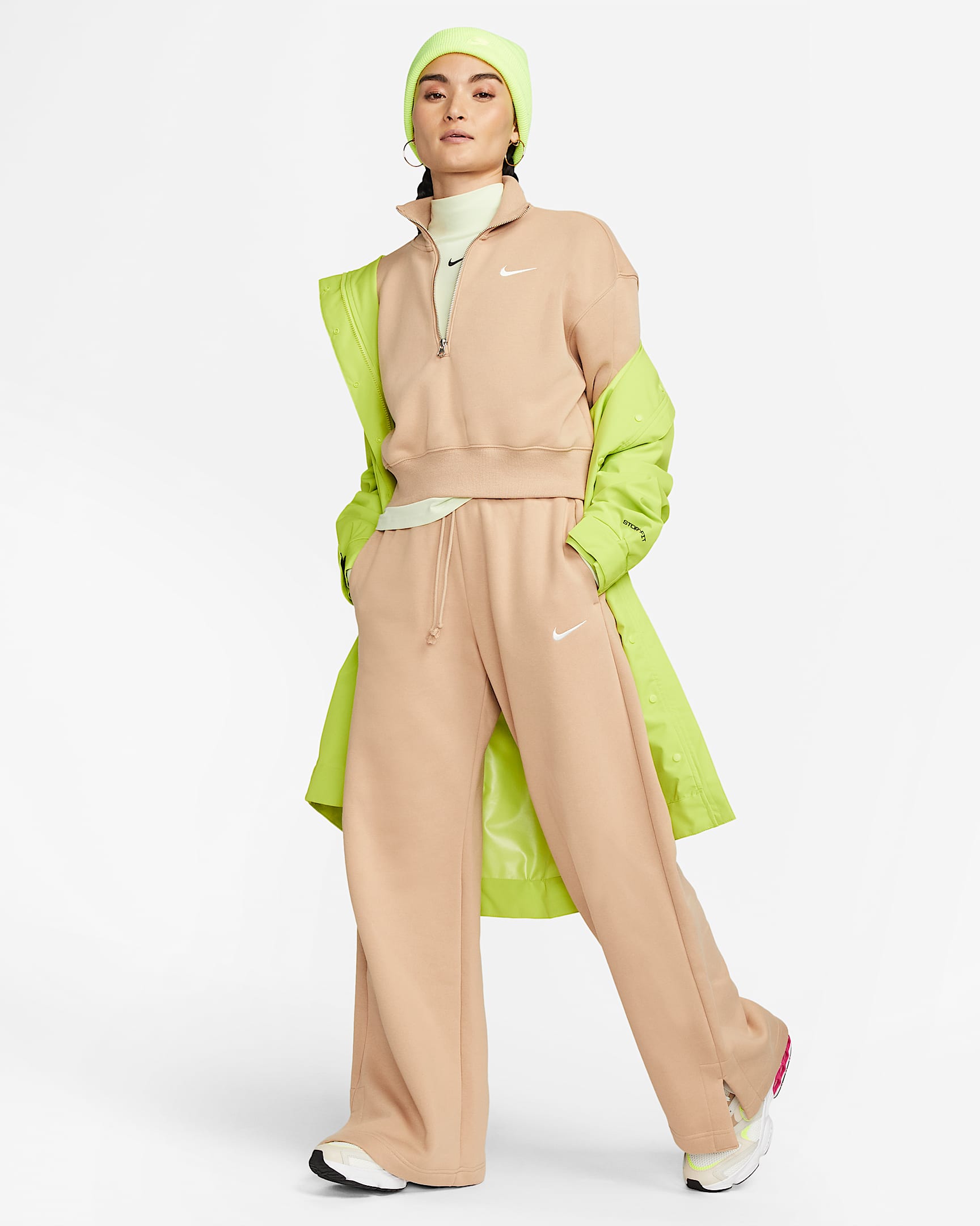 Pantaloni tuta palazzo a vita alta Nike Sportswear Phoenix Fleece