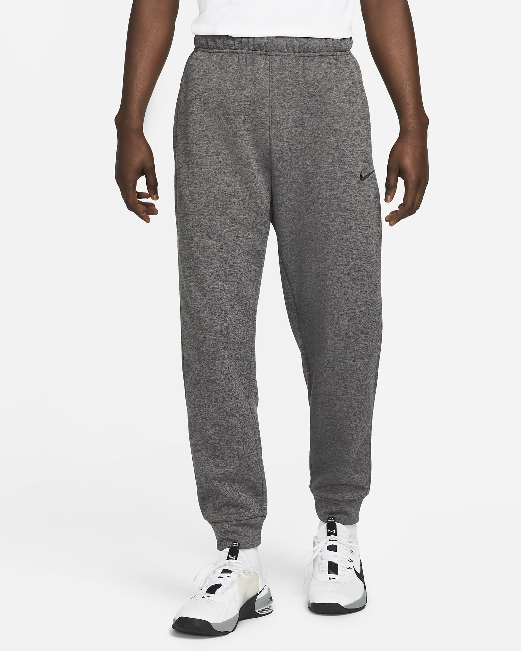Nike Therma Men's Therma-FIT Tapered Fitness Trousers. Nike FI