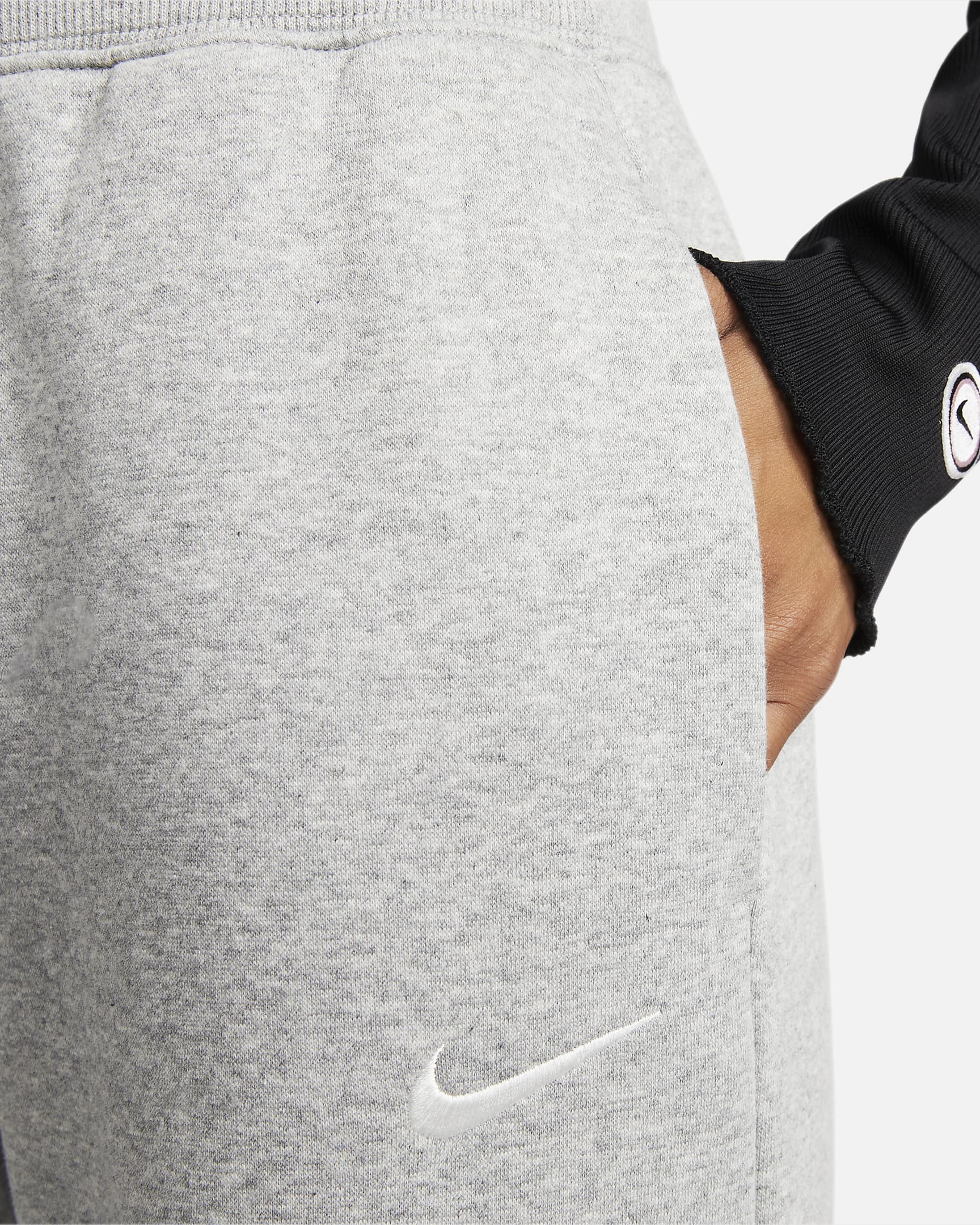 Nike Sportswear Phoenix Fleece Damen-Trainingshose mit hohem Taillenbund und weitem Bein - Dark Grey Heather/Sail