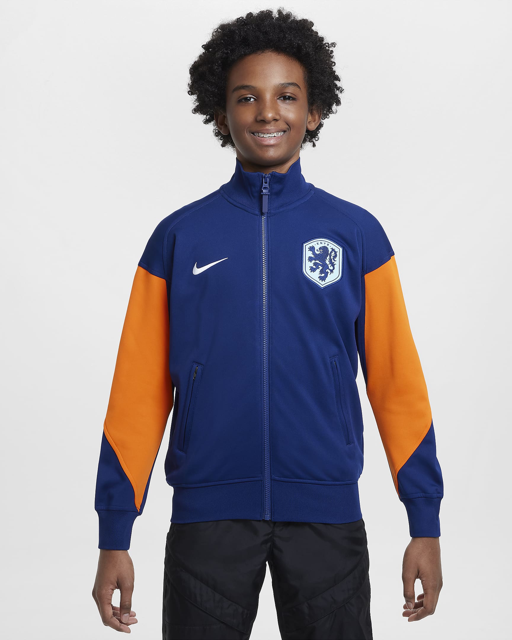 Nederland Academy Pro strikket fotballjakke til store barn - Blue Void/Safety Orange/Hvit