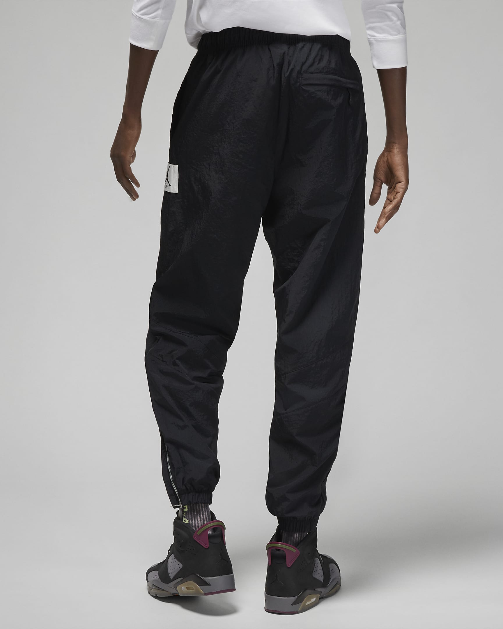 Jordan Essential Men's Statement WarmUp Trousers. Nike PT