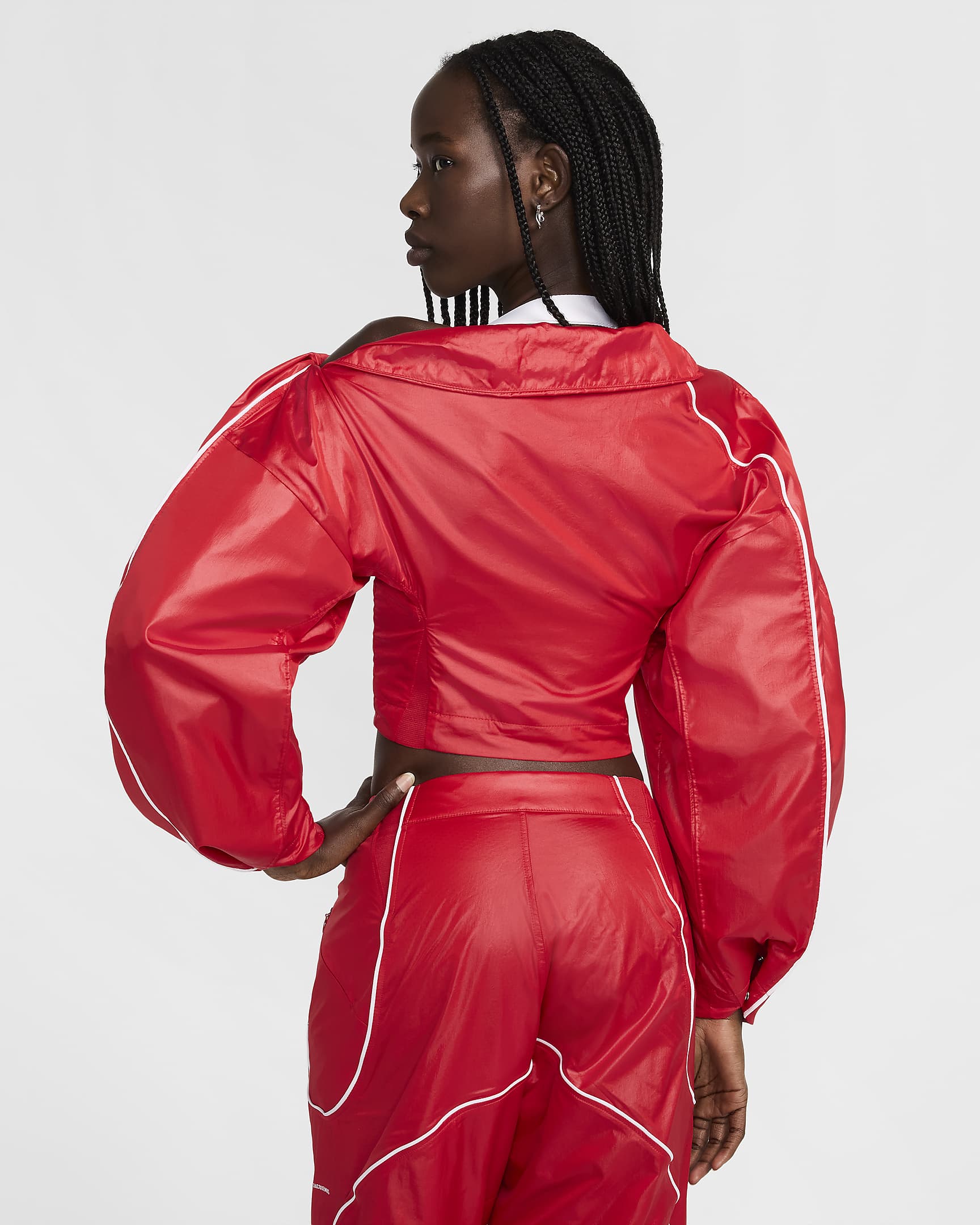 Nike x Jacquemus-løbejakke til kvinder - University Red/hvid