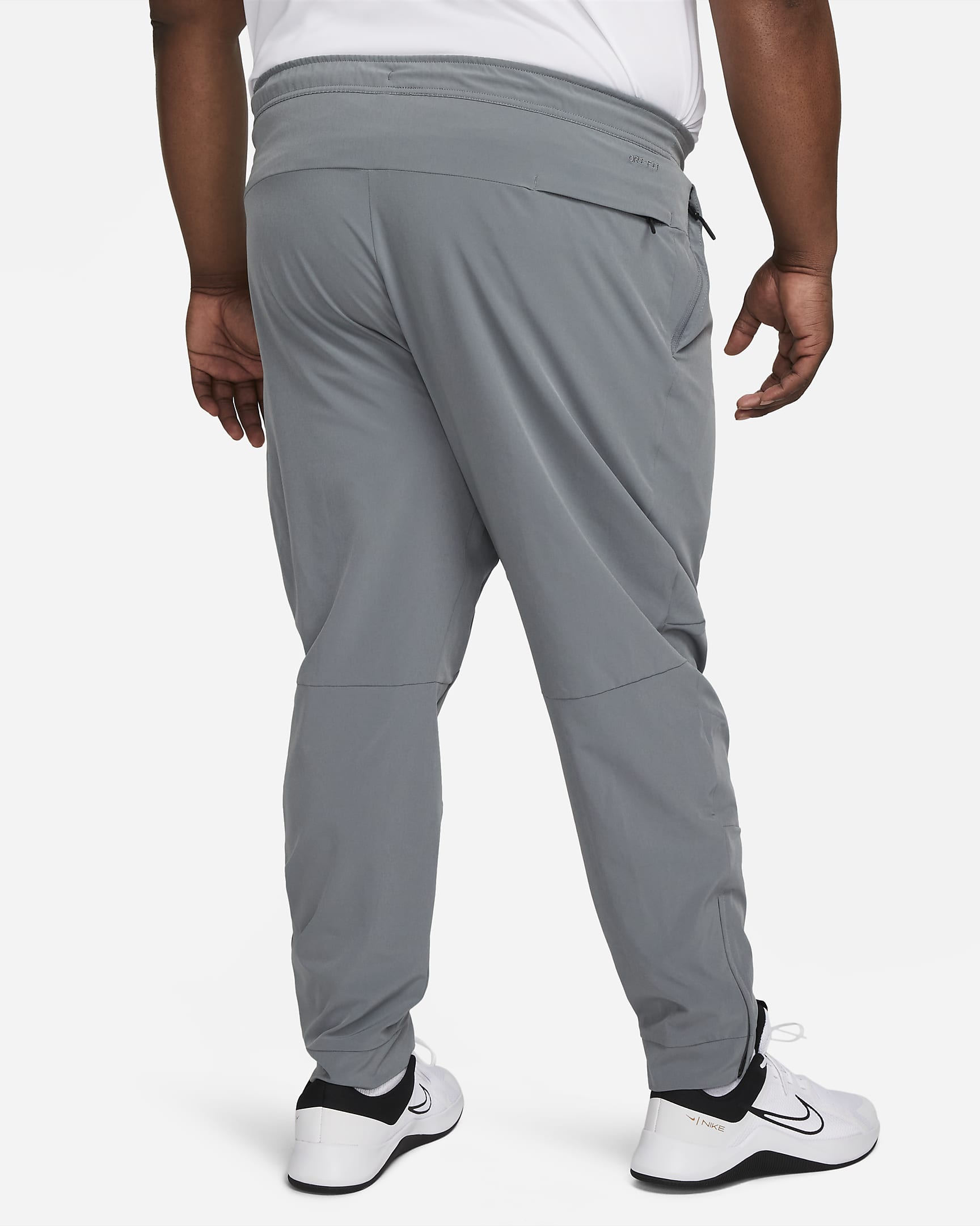 Nike Unlimited Men's Dri-FIT Zippered Cuff Versatile Pants. Nike.com