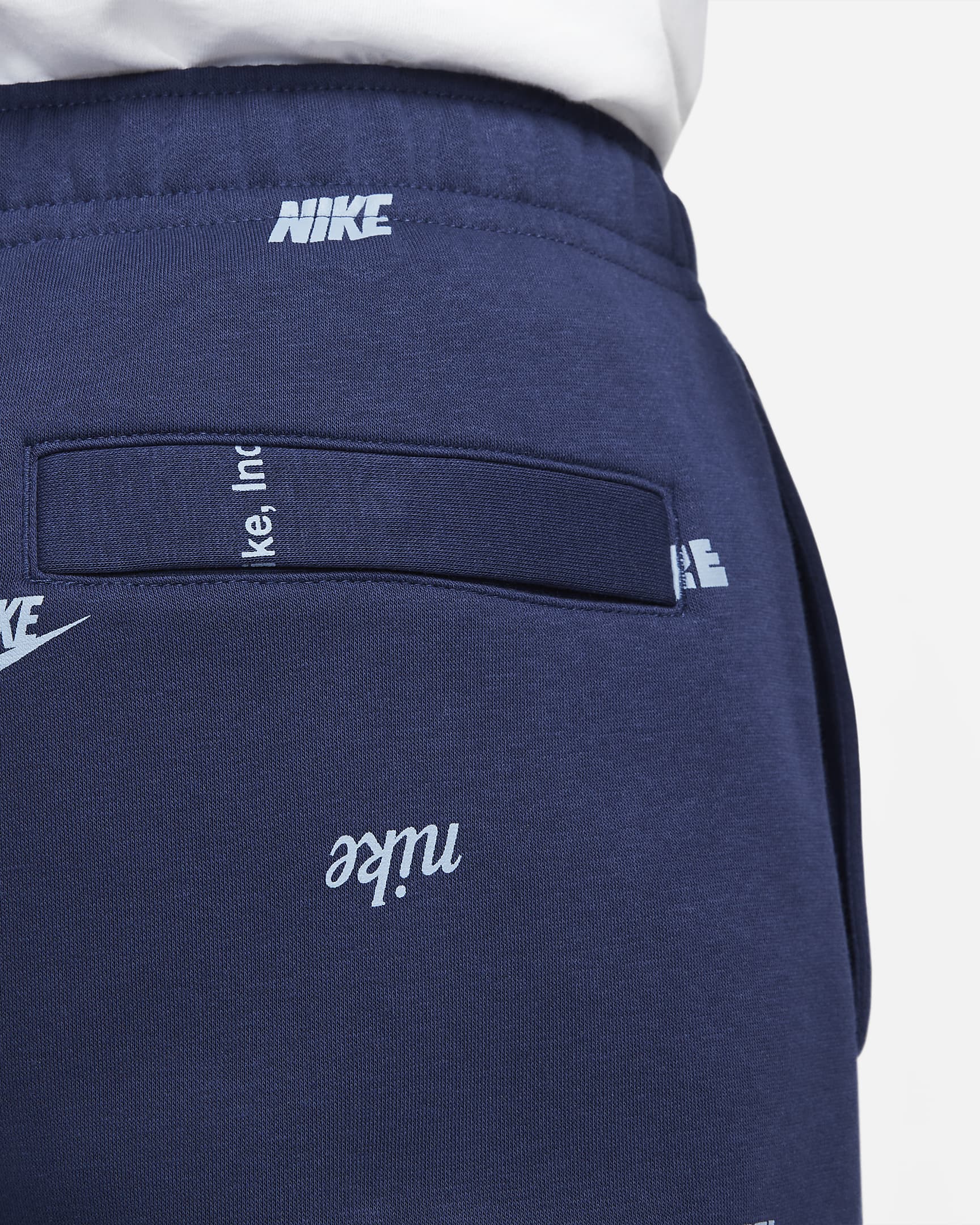 Nike Club Fleece Men's BrushedBack Allover Print Joggers.
