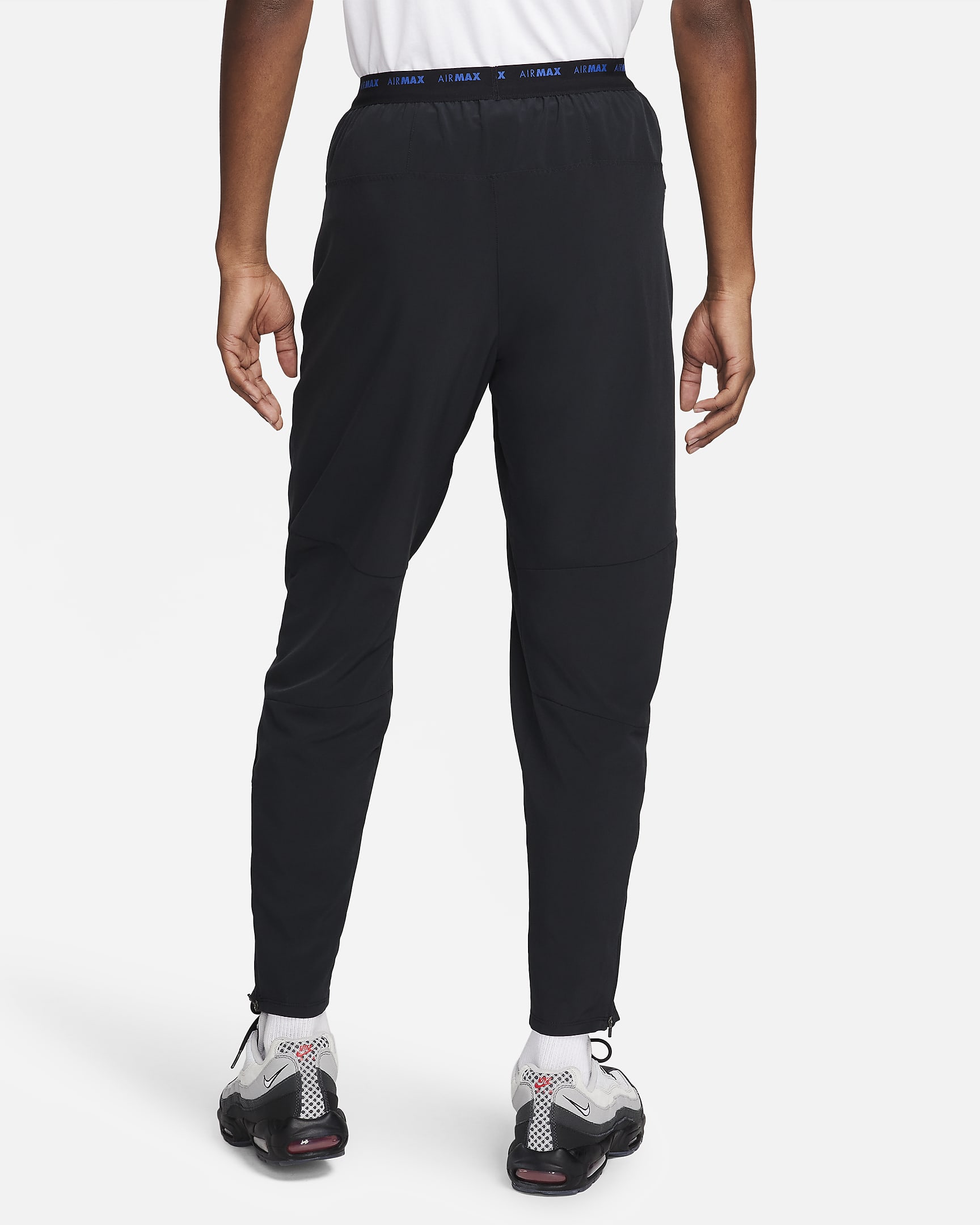 Pantaloni in tessuto Dri-FIT Nike Air Max – Uomo - Nero/Nero/Game Royal