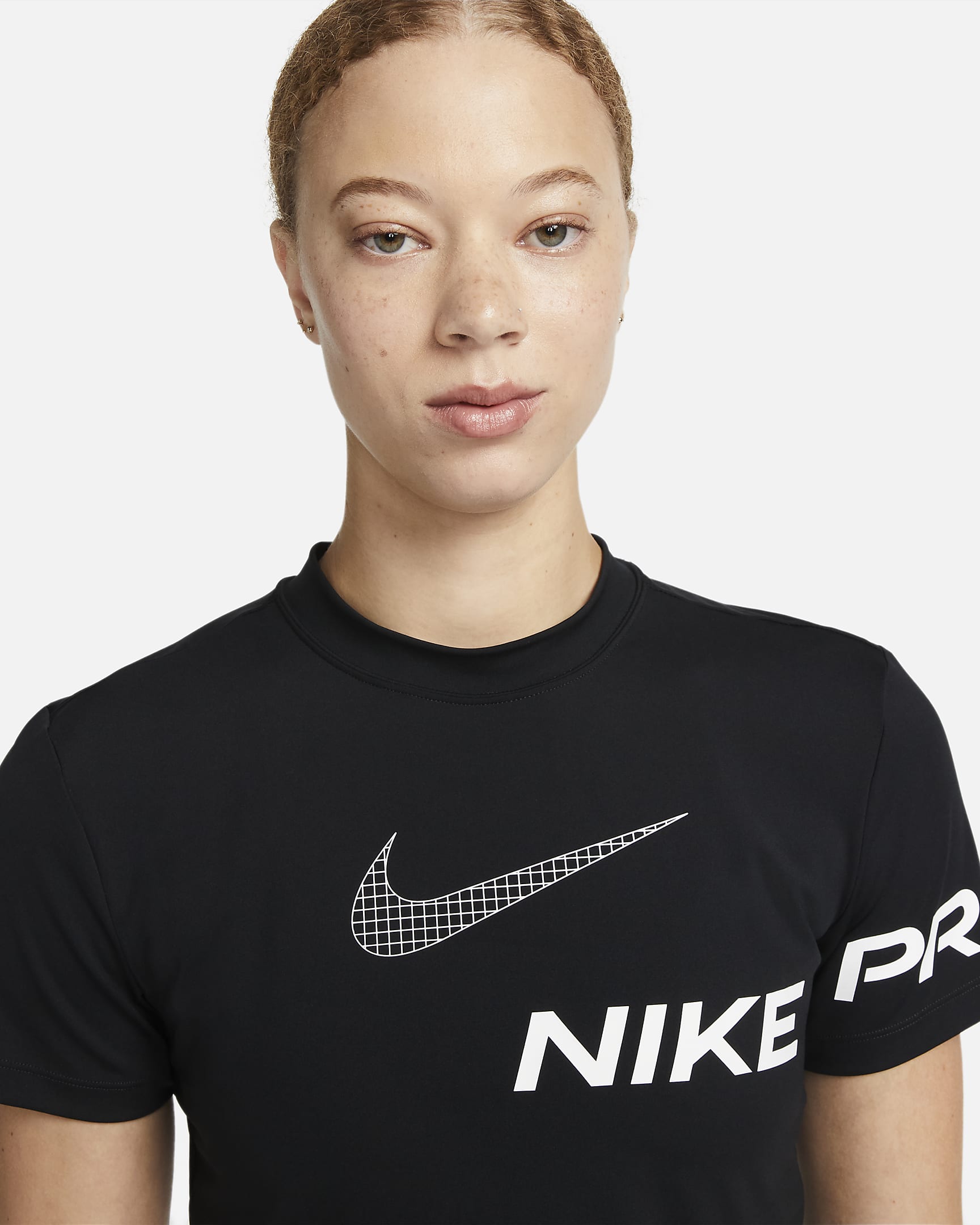 Kort Nike Pro Dri-FIT-træningsoverdel med korte ærmer og grafik til kvinder - sort/hvid