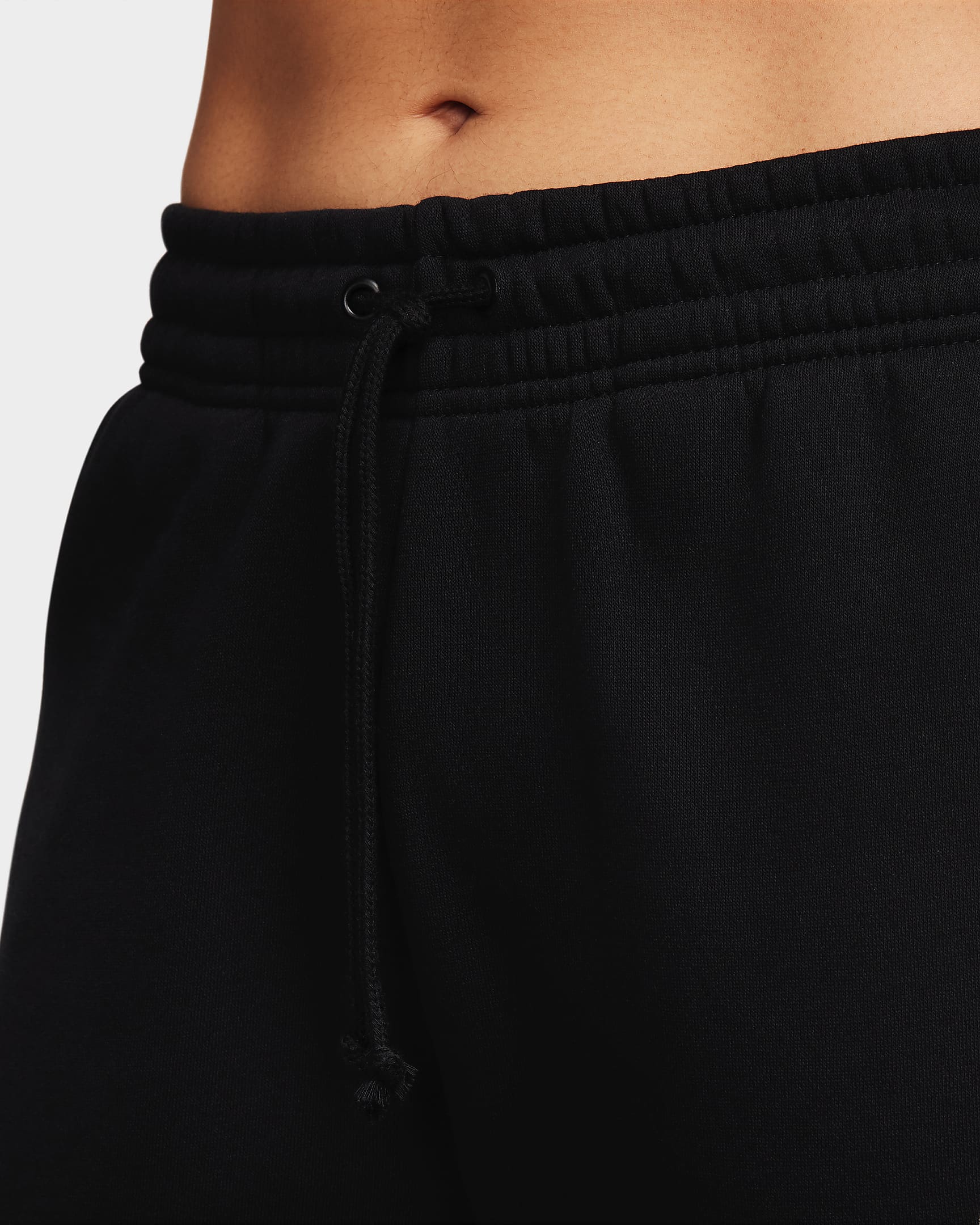 Pantaloni tuta a vita media Nike Sportswear Phoenix Fleece – Donna - Nero/Sail