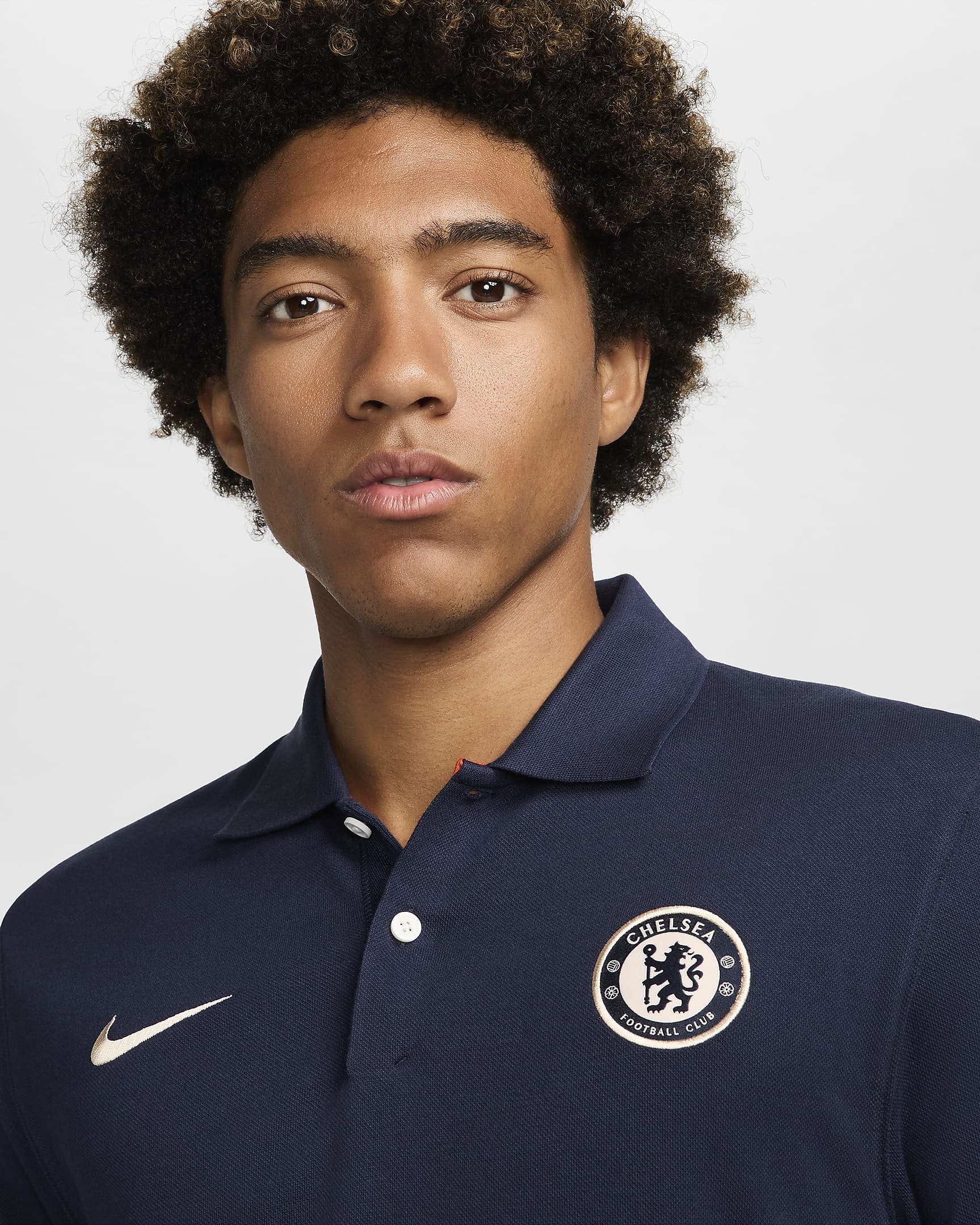 FC Chelsea The Nike Polo Nike Dri-FIT Fußball-Poloshirt (Herren) - Obsidian/Guava Ice