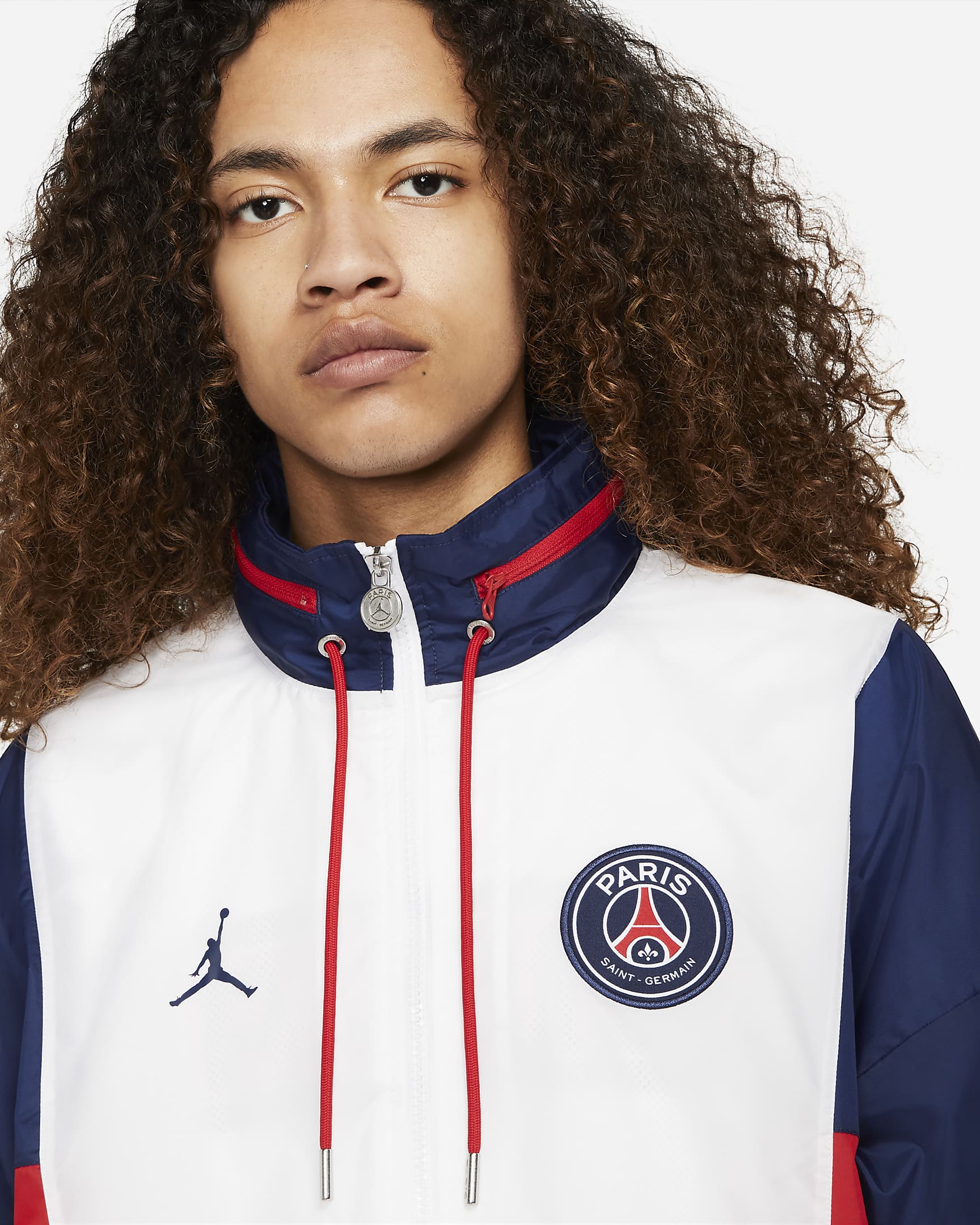 Paris Saint-Germain Men's Nylon Hooded Jacket. Nike NL
