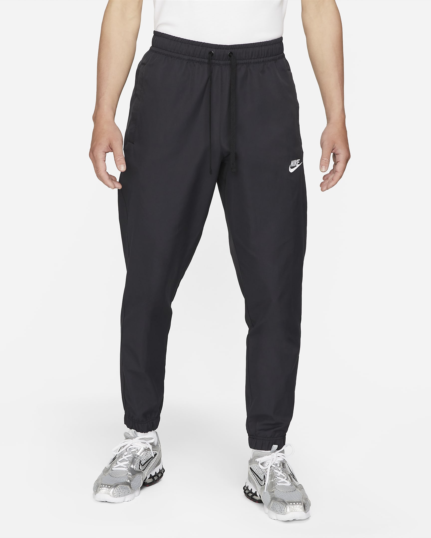 Nike Sportswear Men's Unlined Cuff Trousers. Nike VN