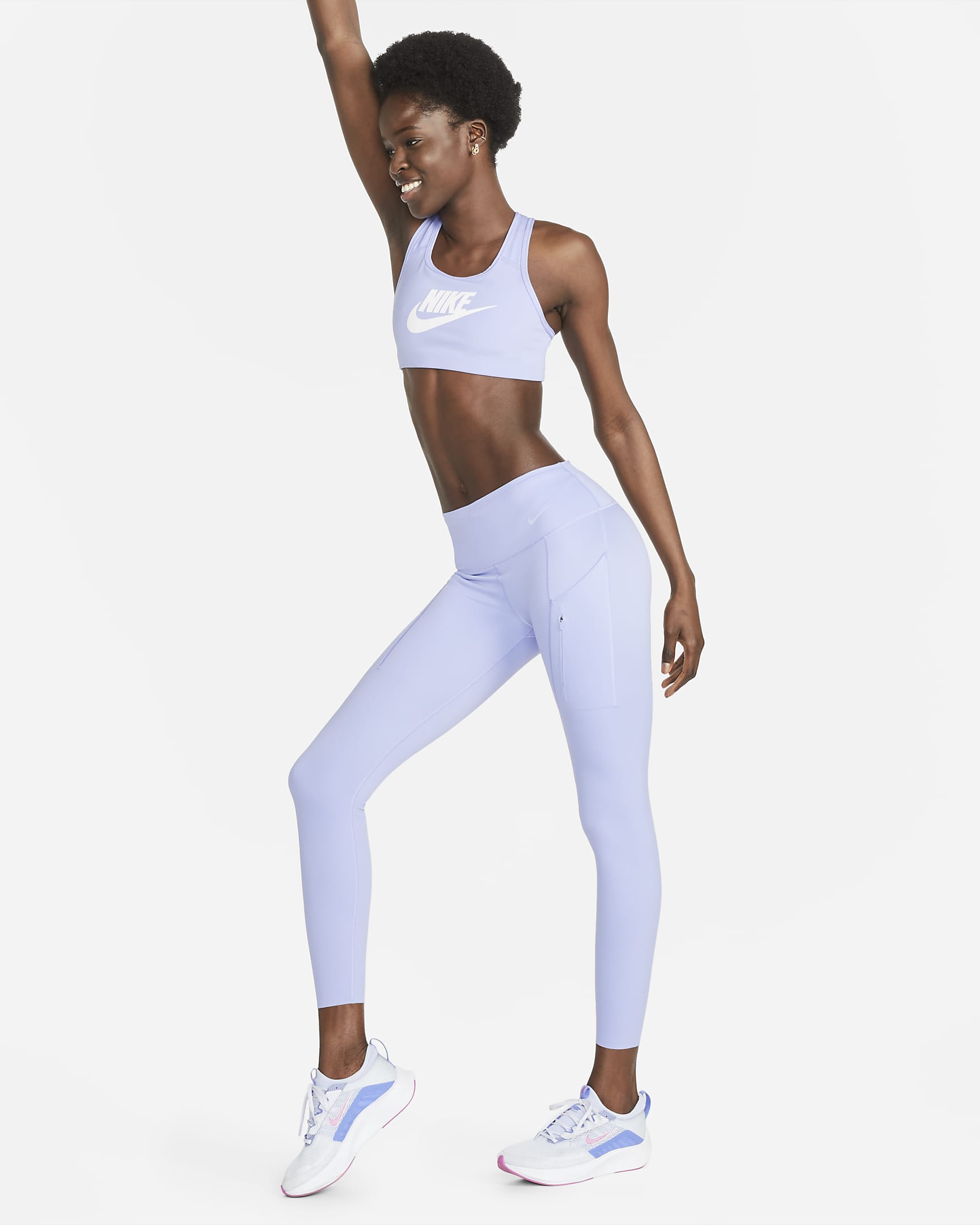 Nike Go Women's Firm-Support Mid-Rise 7/8 Leggings with Pockets. Nike NO