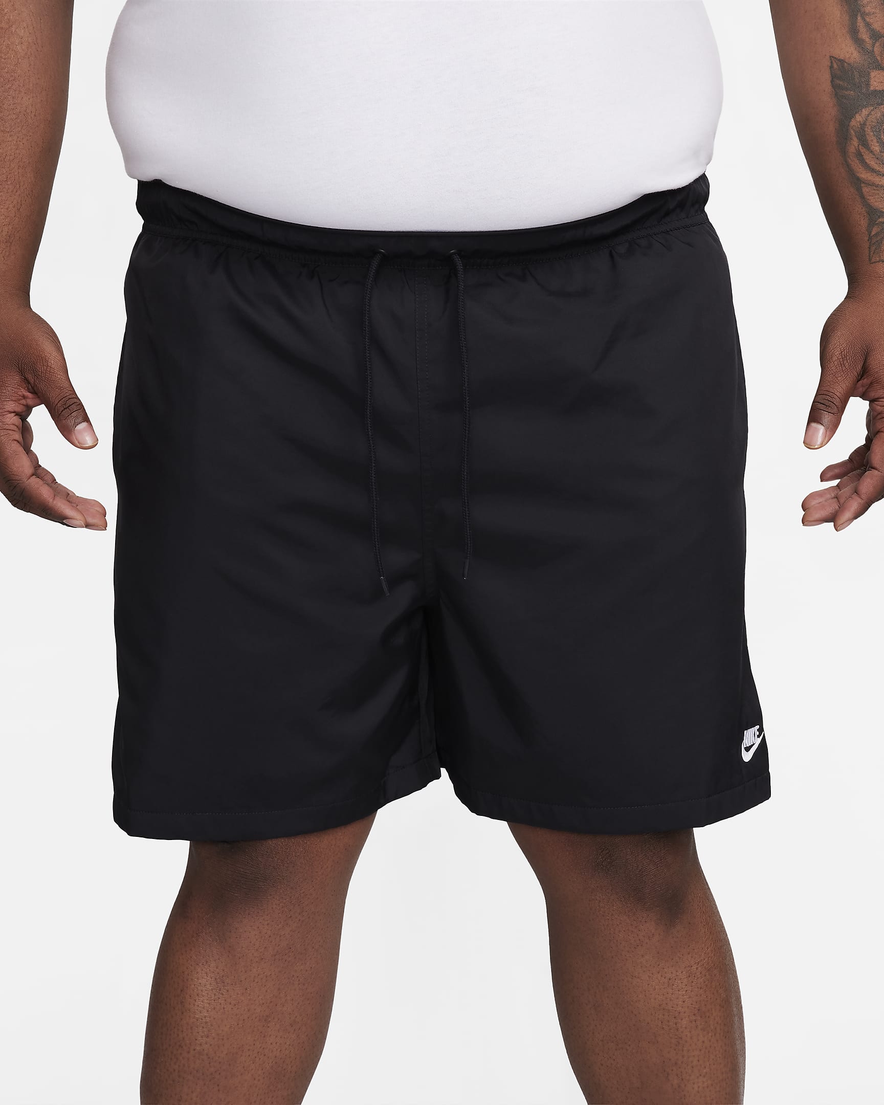 Shorts Flow in tessuto Nike Club – Uomo - Nero/Bianco