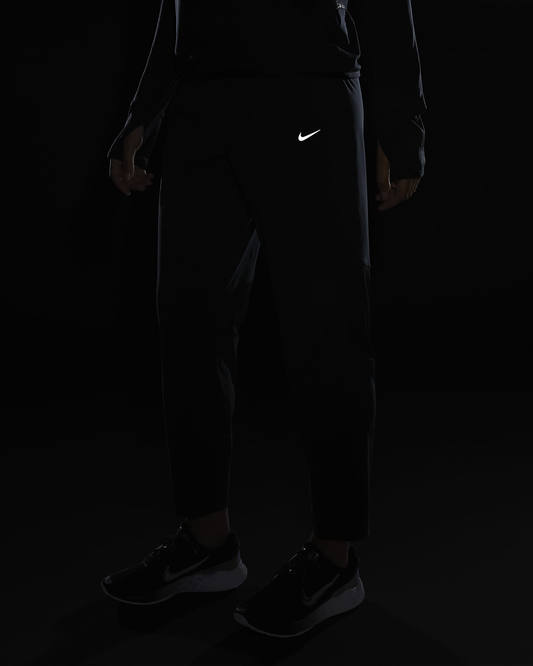 Nike Dri-FIT Fast 7/8-Laufhose mit mittelhohem Bund für Damen - Schwarz