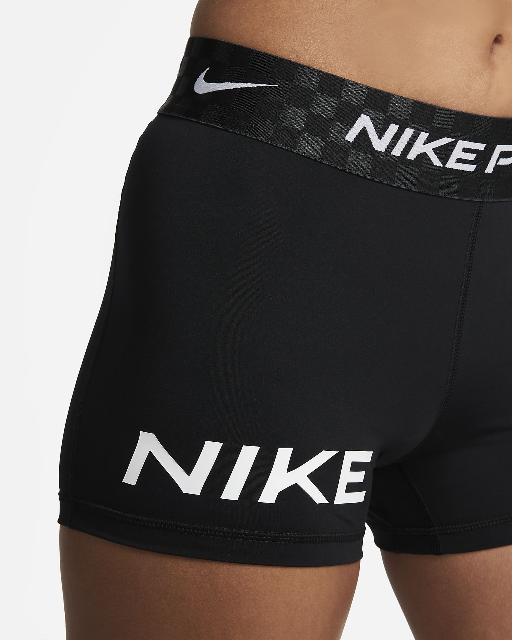 Nike Pro Dri-FIT Pantalón corto de entrenamiento y talle medio con estampado de 8 cm - Mujer - Negro/Anthracite/Blanco