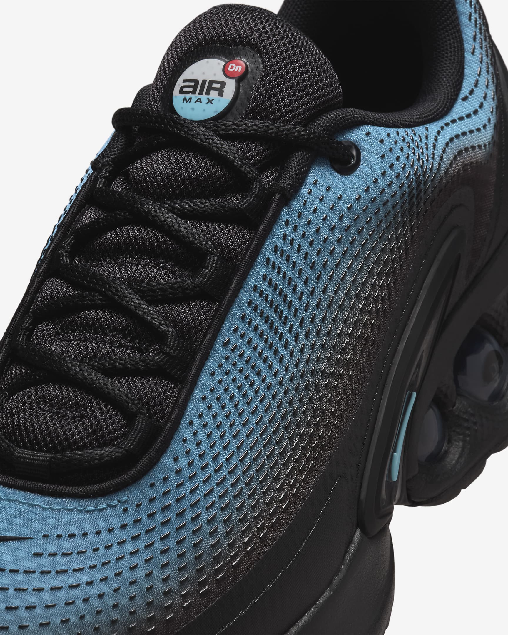 Tenis Nike Air Max Dn - Negro/Gris azulado/Rojo cometa/Azul báltico