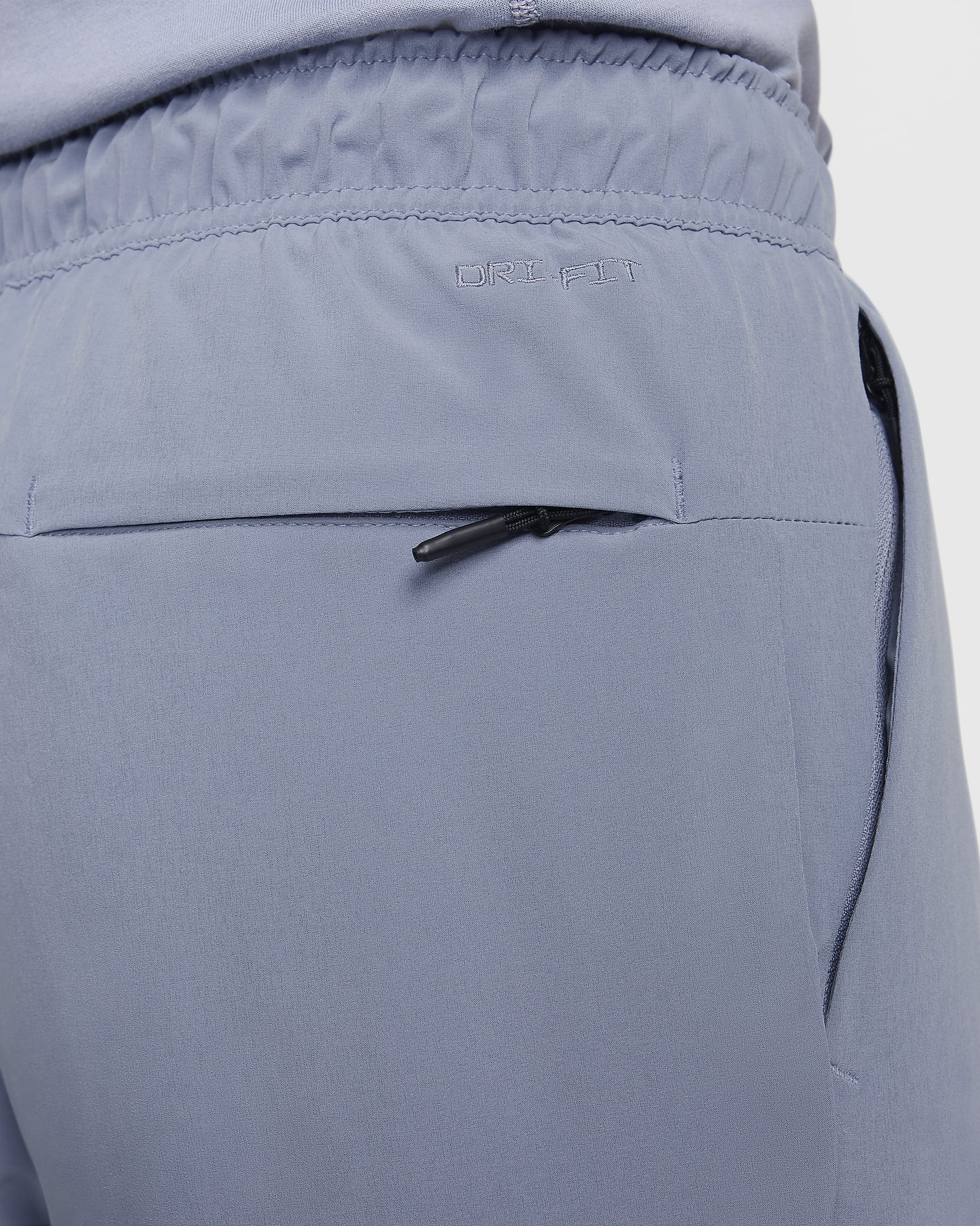 mens nike pants with zipper pockets