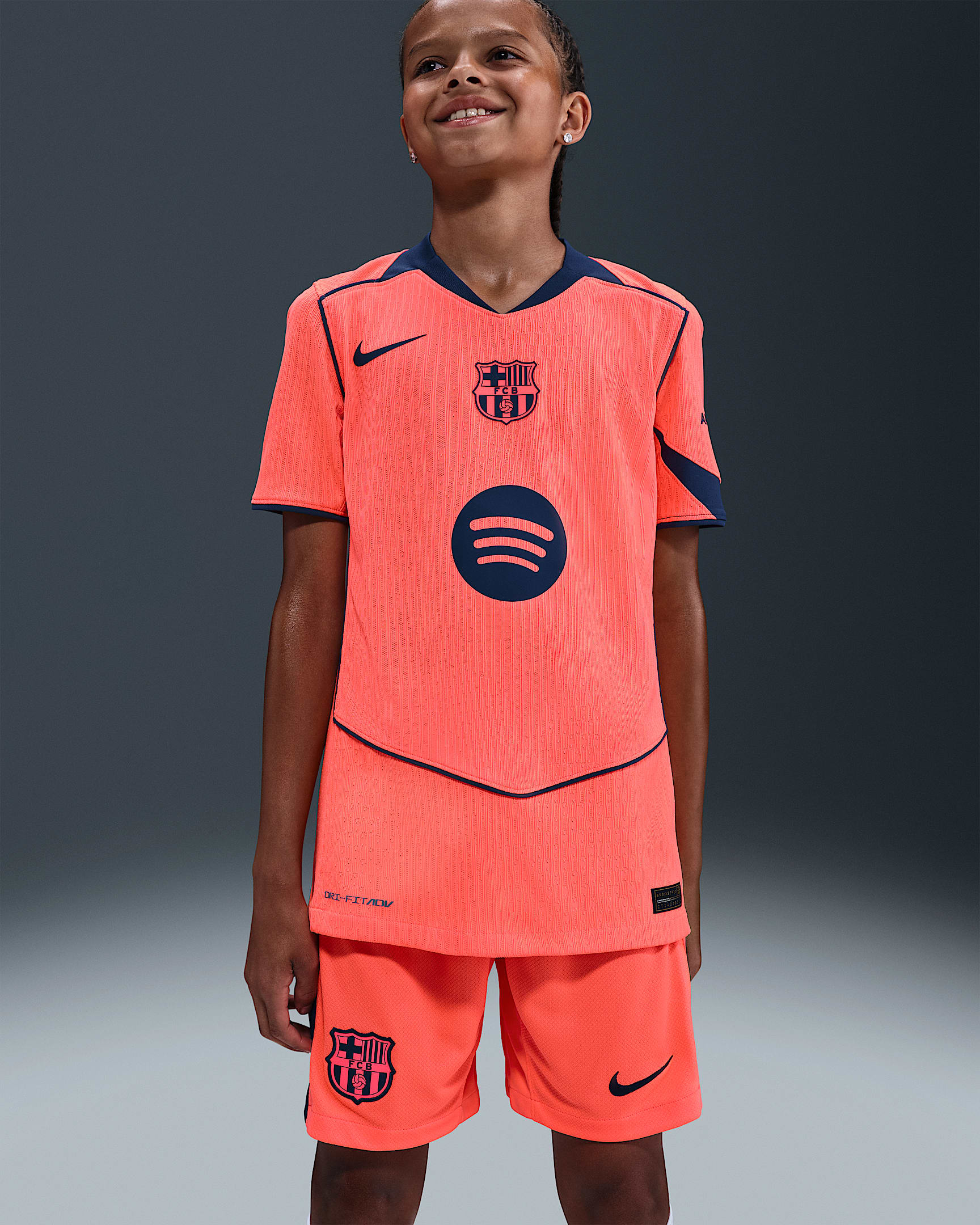 F.C. Barcelona 2025/26 Match Third Older Kids' Nike Dri-FIT ADV Total 90 Football Authentic Shirt - Bright Mango/Midnight Navy/Midnight Navy