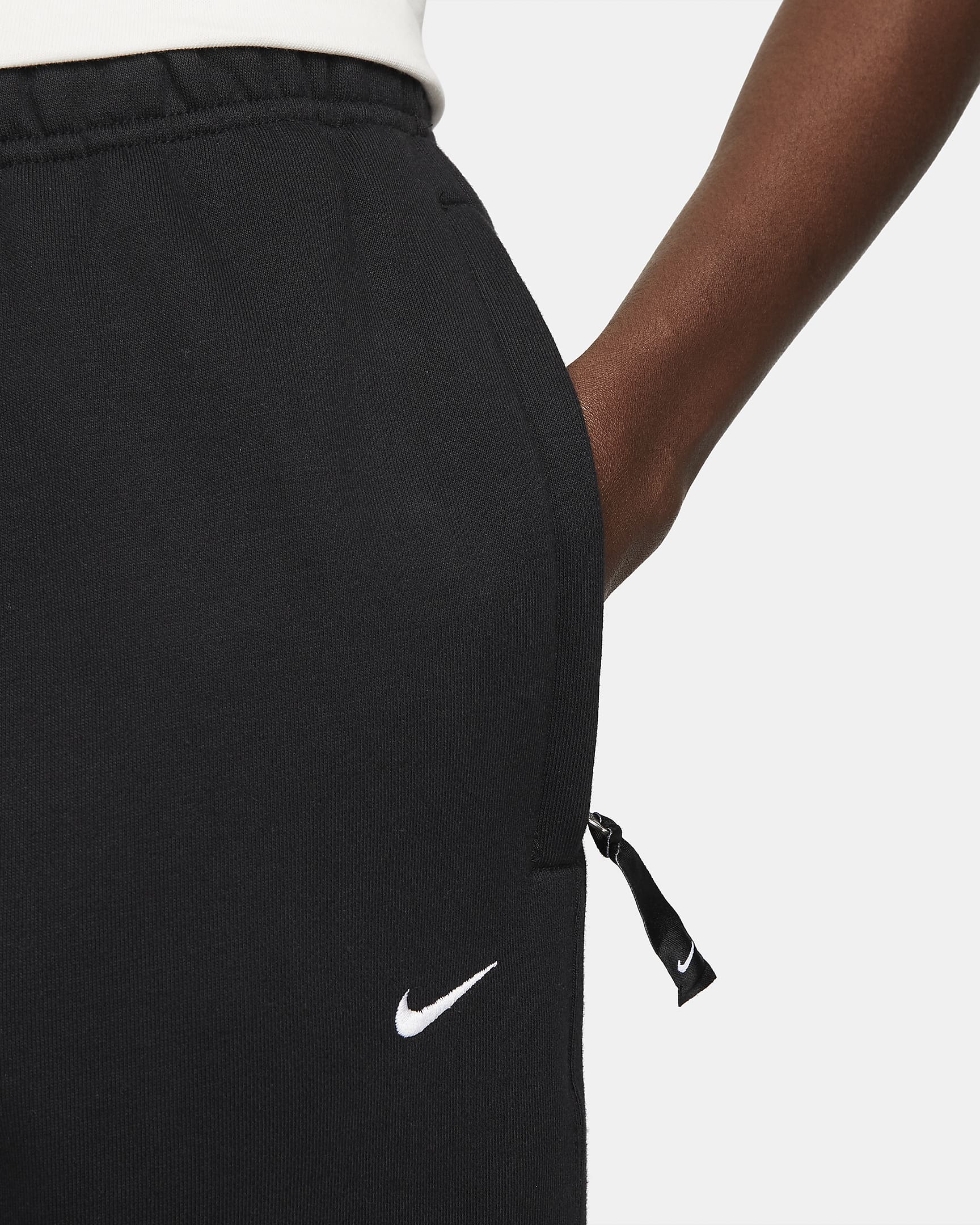 Pantalon en tissu Fleece Nike Solo Swoosh pour Homme - Noir/Blanc