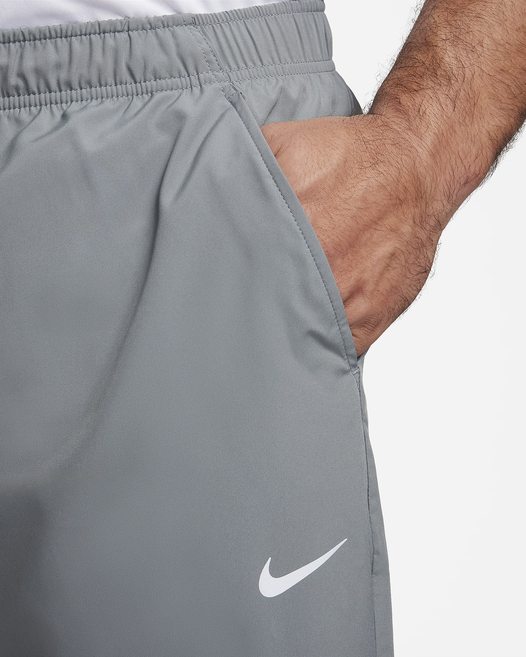 Pants Dri-FIT entallados versátiles para hombre Nike Form - Gris humo/Negro