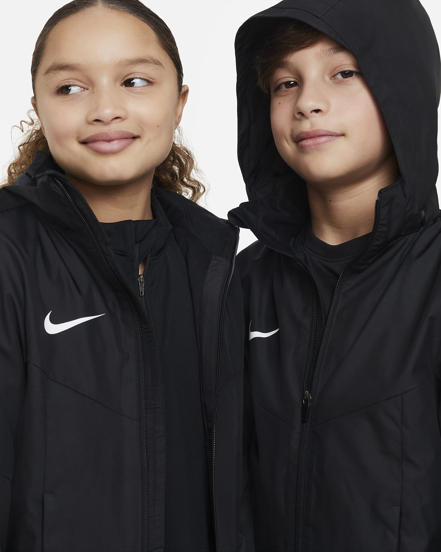 Nike Storm-FIT Academy23 Older Kids' Football Rain Jacket - Black/White