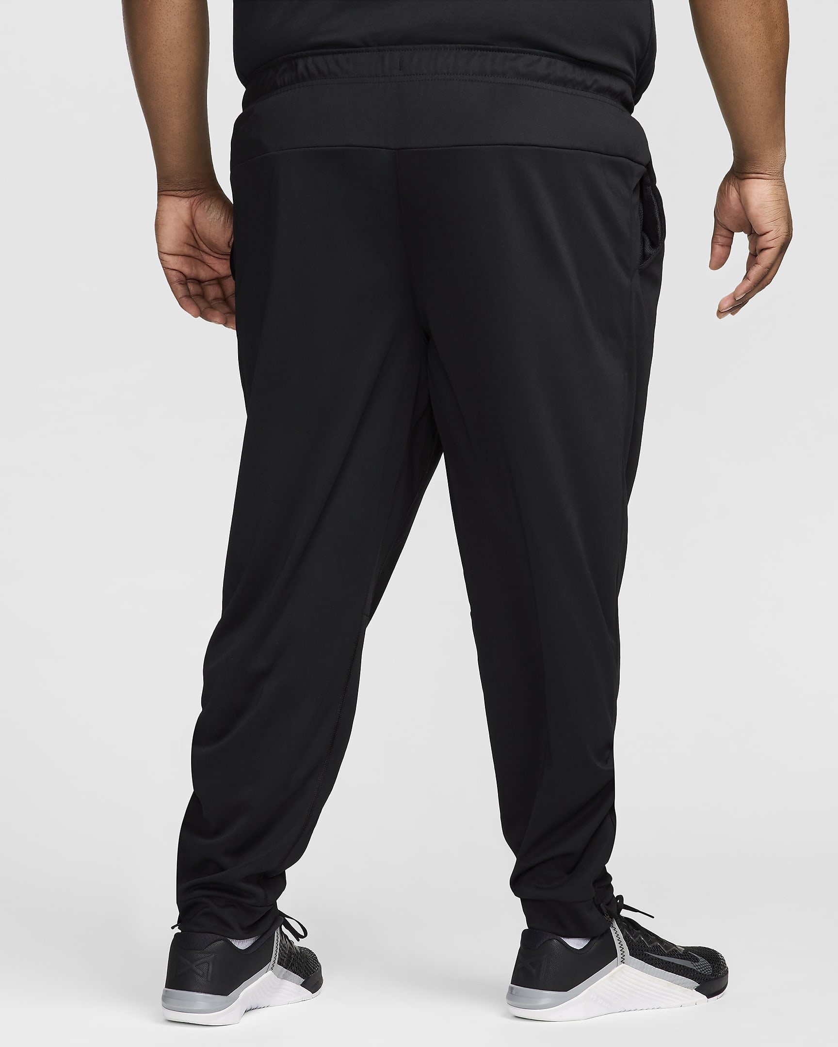 Nike Totality vielseitige Hose mit schmal zulaufender Passform und für Herren - Schwarz/Weiß