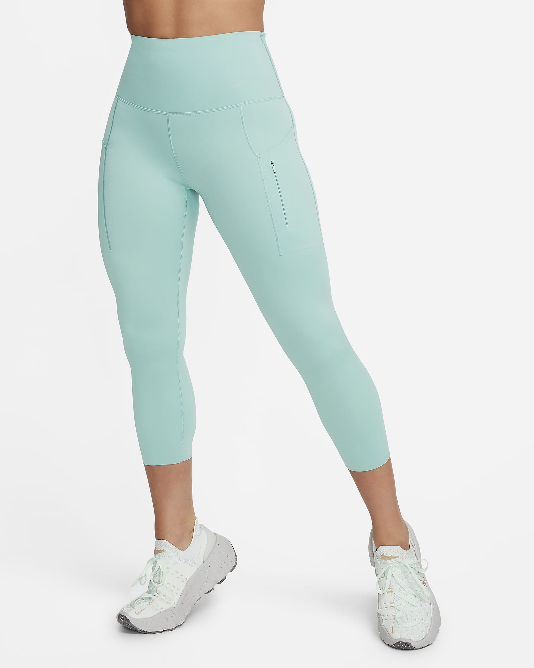 Leggings cropped de tiro alto y sujeción firme con bolsillos para mujer Nike Go - Mineral/Negro