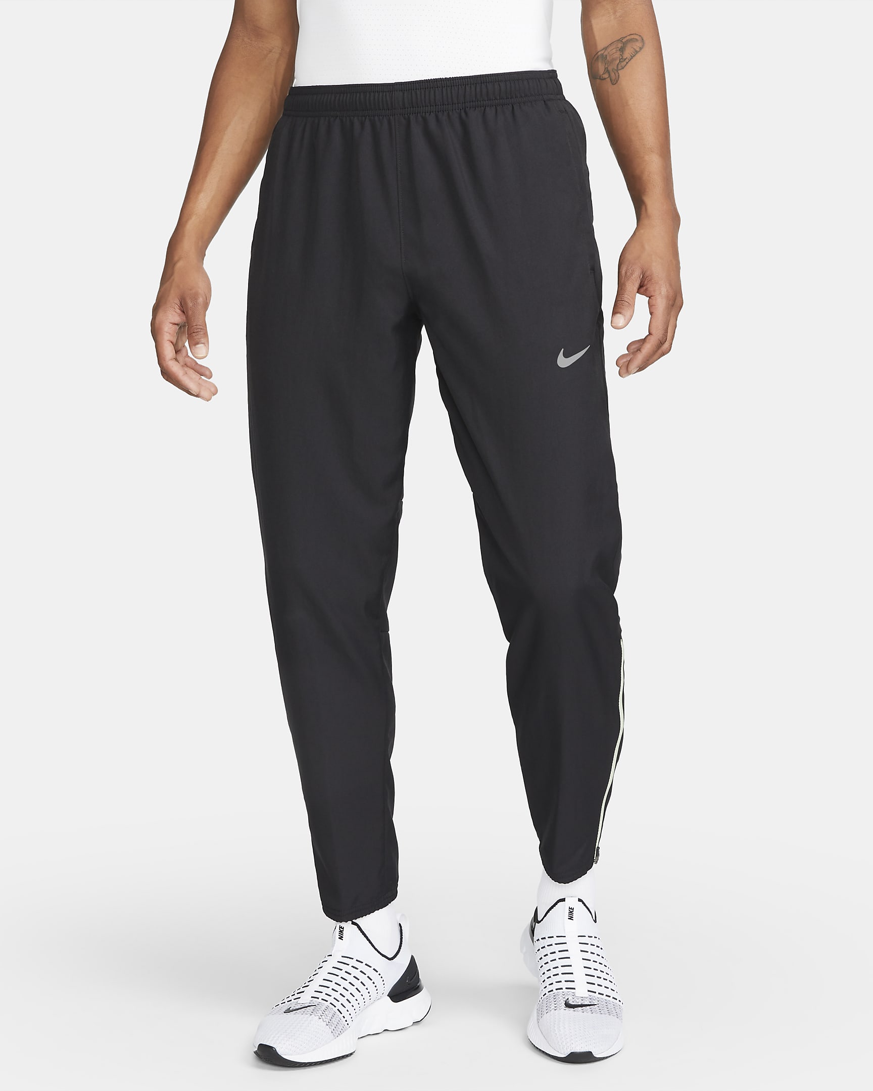 Nike Dri-FIT Challenger Men's Woven Running Trousers. Nike NO