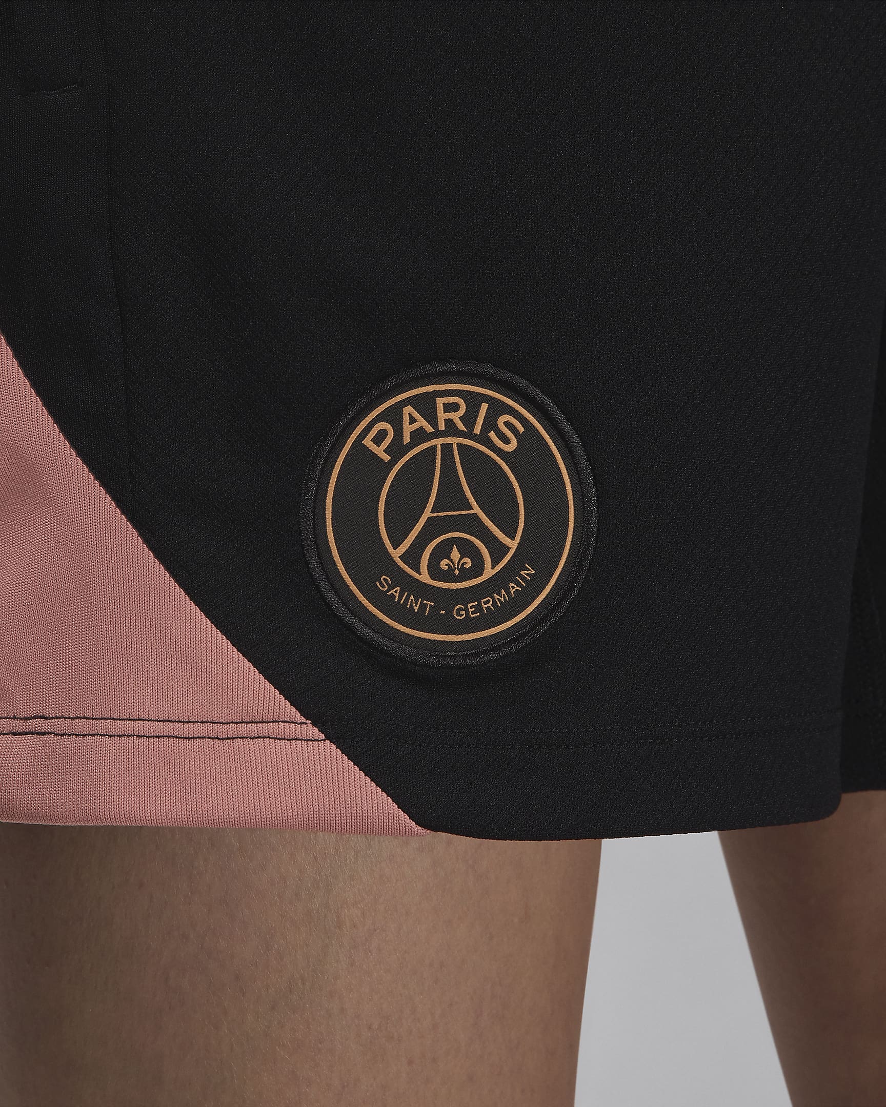 Damskie dzianinowe spodenki piłkarskie Jordan Dri-FIT Paris Saint-Germain Strike (wersja trzecia) - Czerń/Rust Pink/Rust Pink