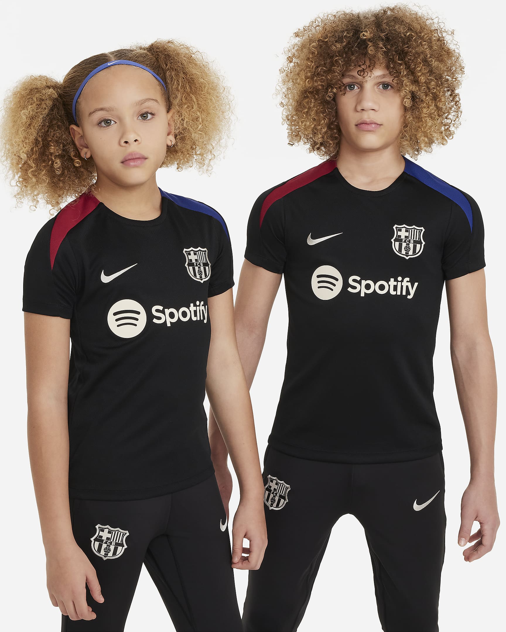 Camisola de futebol de malha de manga curta Nike Dri-FIT Strike FC Barcelona Júnior - Preto/Vermelho Noble/Azul Royal intenso/Castanho Orewood claro