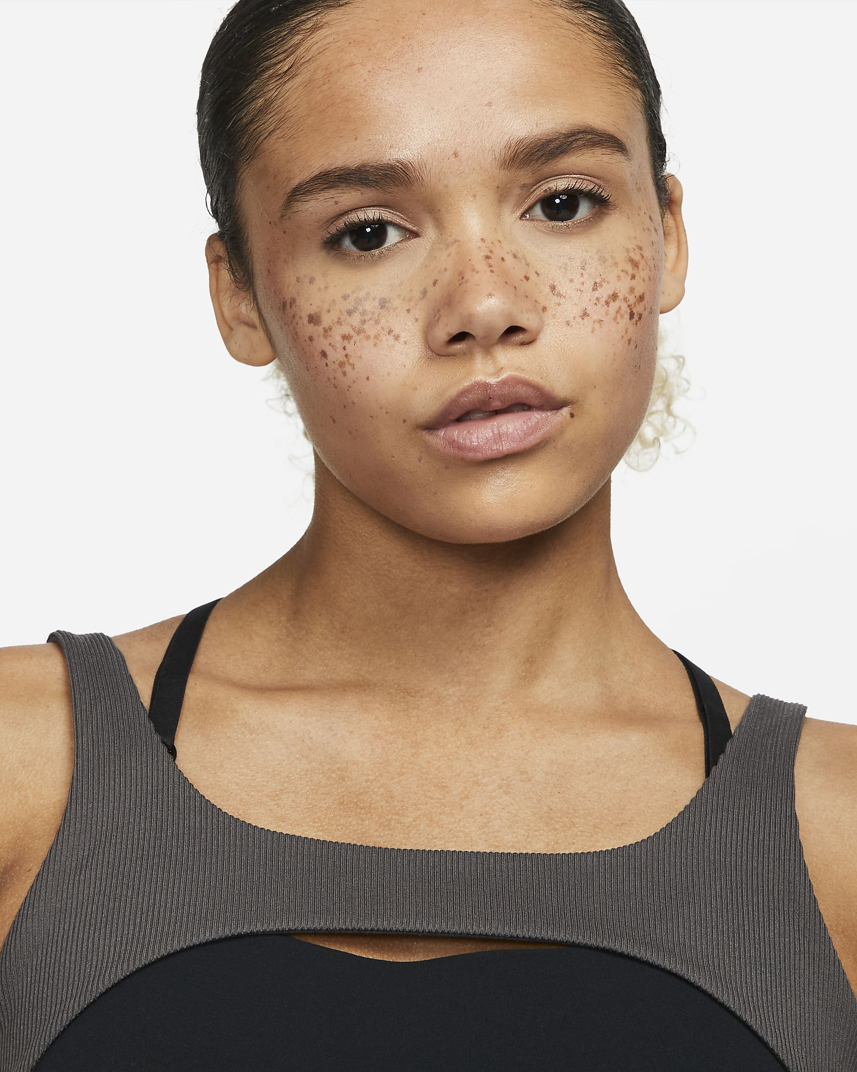 Nike Yoga Indy Women's LightSupport Lightly Lined Ribbed Sports Bra.