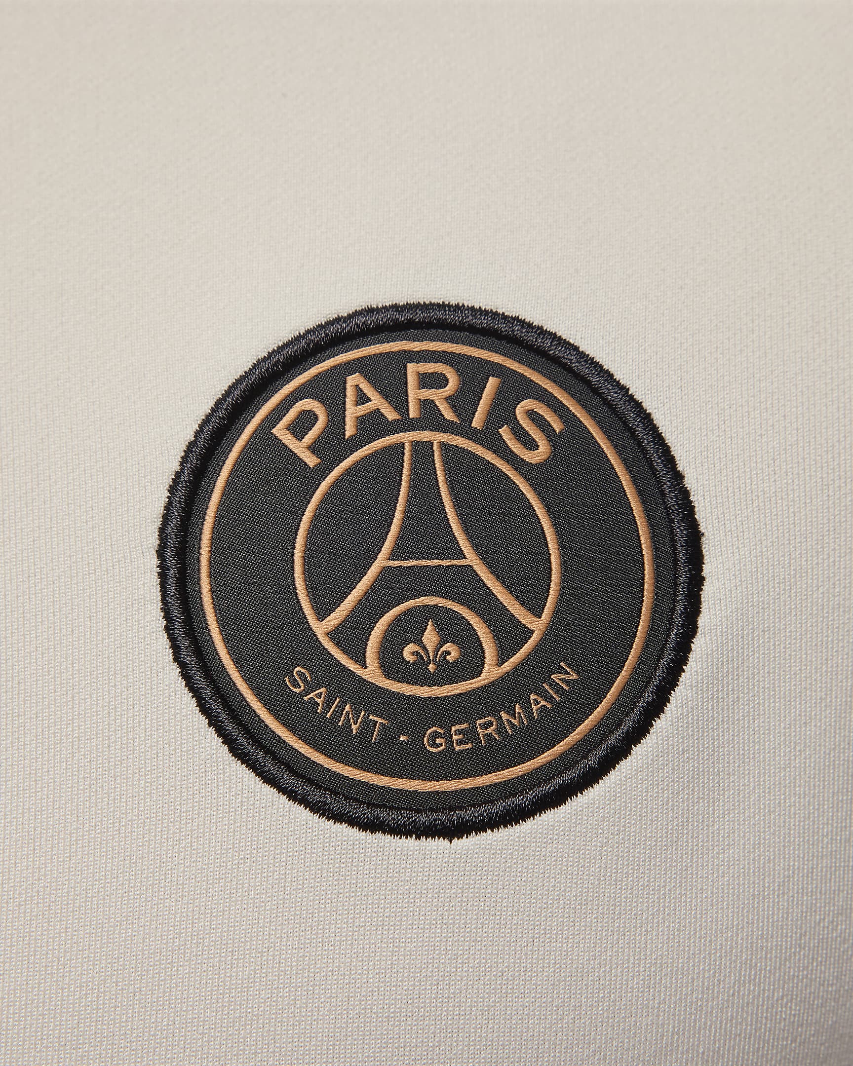 Męska treningowa koszulka piłkarska Jordan Dri-FIT Paris Saint-Germain Strike (wersja trzecia) - Pale Ivory/Rust Pink/Czerń